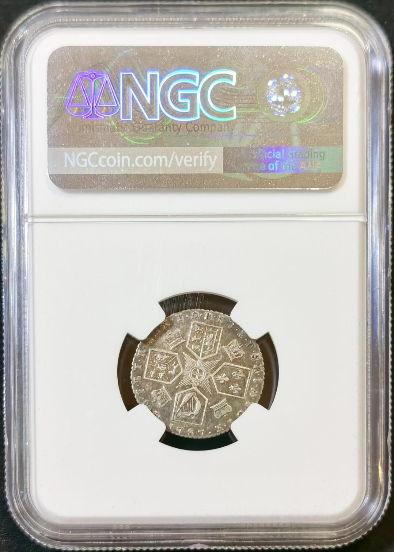 甄臻铺-世界币章拍卖（第48期）精品场拍品征集中，送拍享返佣金等优惠多多 NGC-AU55 1787年英国乔治三世六便士银币，正面刻有乔治三世头像，背面是六边形纹章图案和十字星装饰