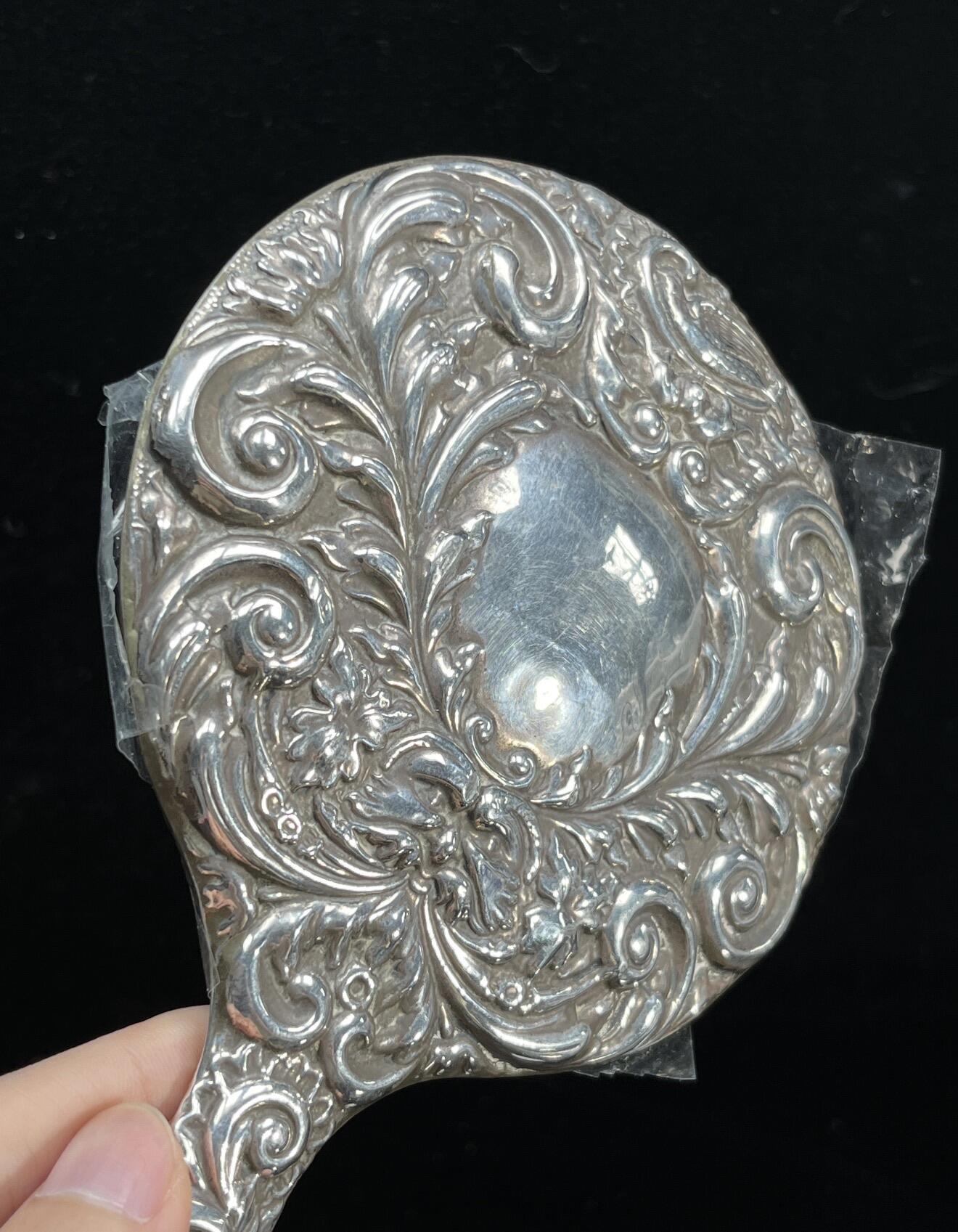 回流银器杂项 246克欧洲风格20世纪左右银手镜一件，局部点测表面含银92%左右