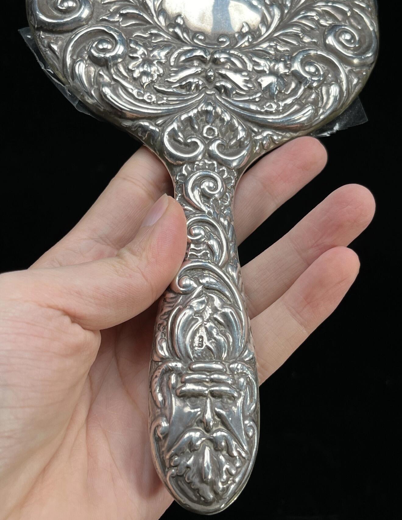 回流银器杂项 246克欧洲风格20世纪左右银手镜一件，局部点测表面含银92%左右