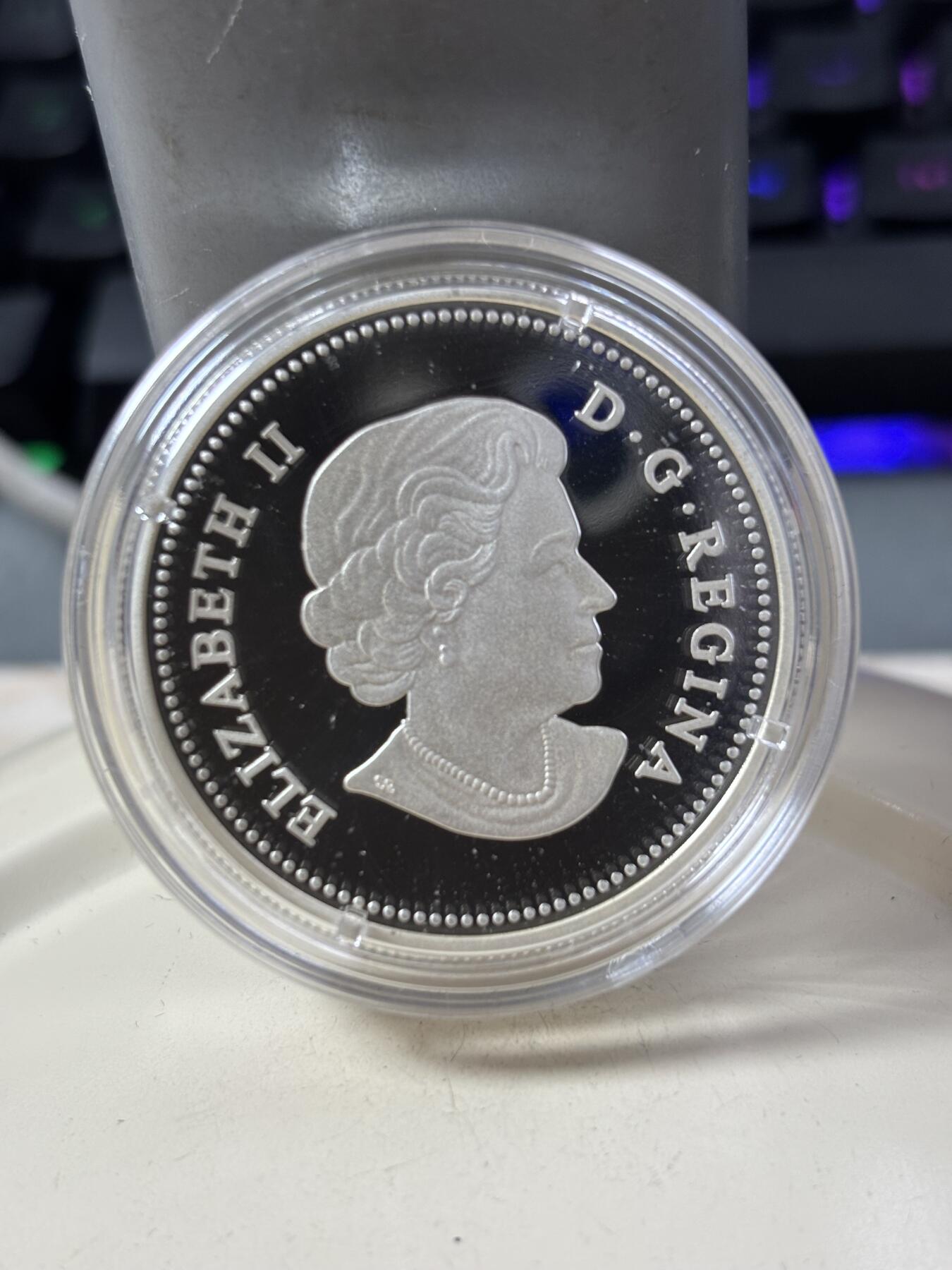 第188期拍卖 加拿大2015年圣诞节系列麋鹿镶嵌黄水晶银币,9999银，1盎司，发行量7500枚