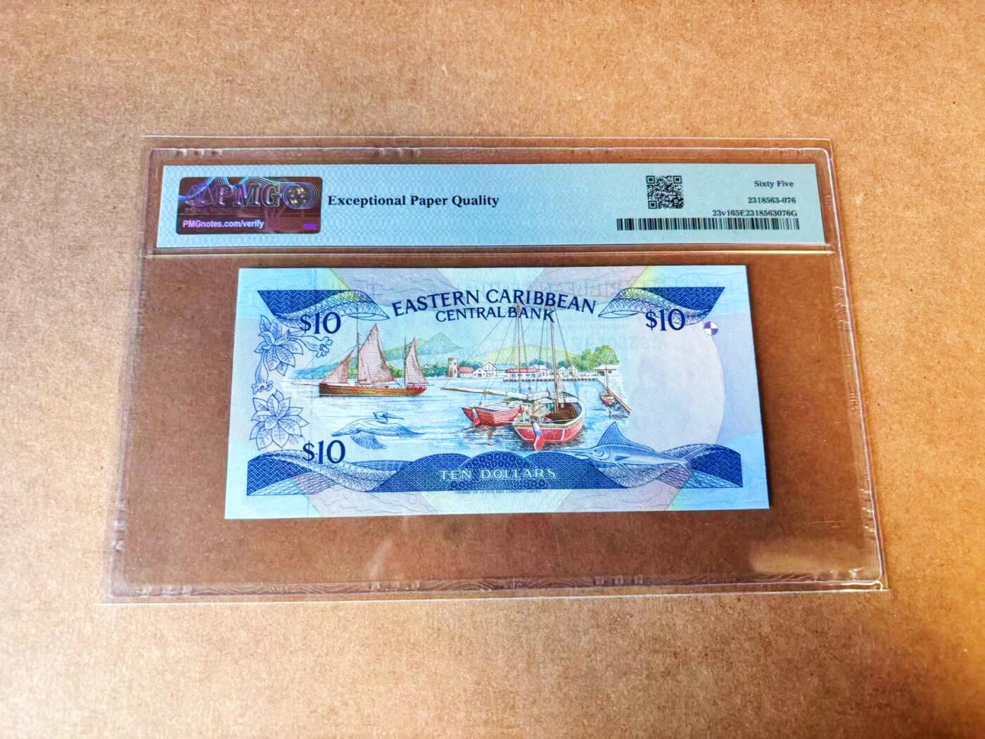 【Blue Auction】世界纸币精拍第776期——18级TOP拍卖/信誉/品质/专业/高效💫 【无47】东加勒比 1985-93年10元 女王 小彩背 PMG65EPQ 