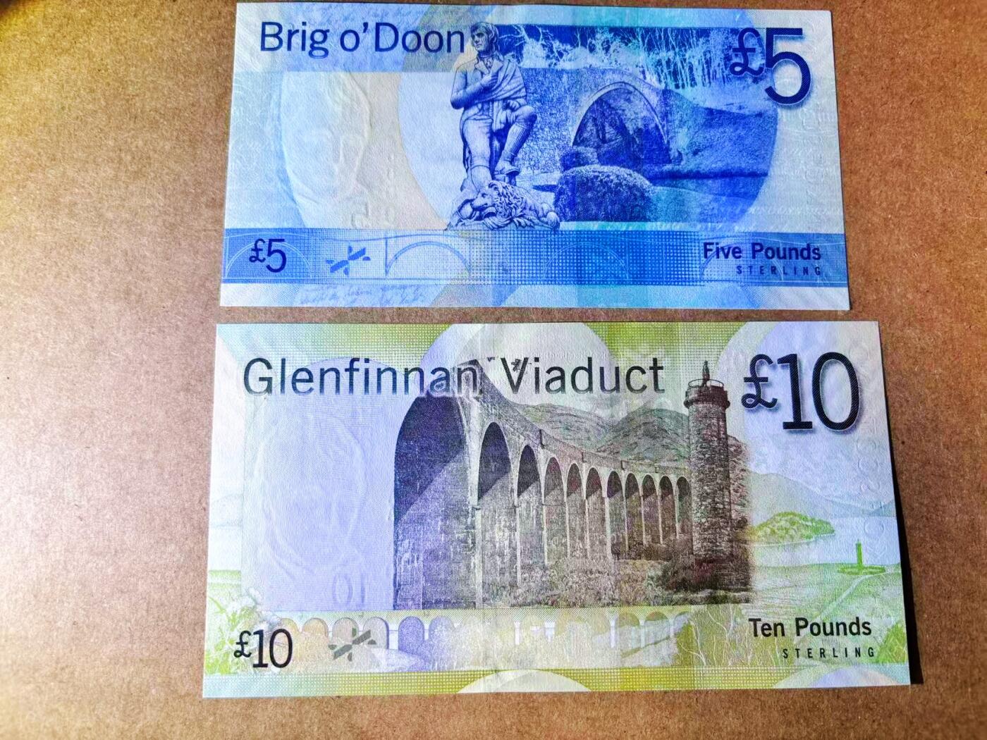 【Blue Auction】世界纸币精拍第776期——18级TOP拍卖/信誉/品质/专业/高效💫 【一组5张AA冠000009个位号全同套极罕见 含IBNS获奖钞 20镑有行长及司库长Stevenson & Matthew亲笔签名非常罕见 收藏级】苏格兰 2007年5-100镑 设计精美 全新UNC 油墨凹凸感非常好 单张9号的获奖钞价值就非凡（100镑水印处非受潮原因的荧光极轻微一小点反应 之前遇到过多张类似的苏格兰纸币都给了66分影响不大）