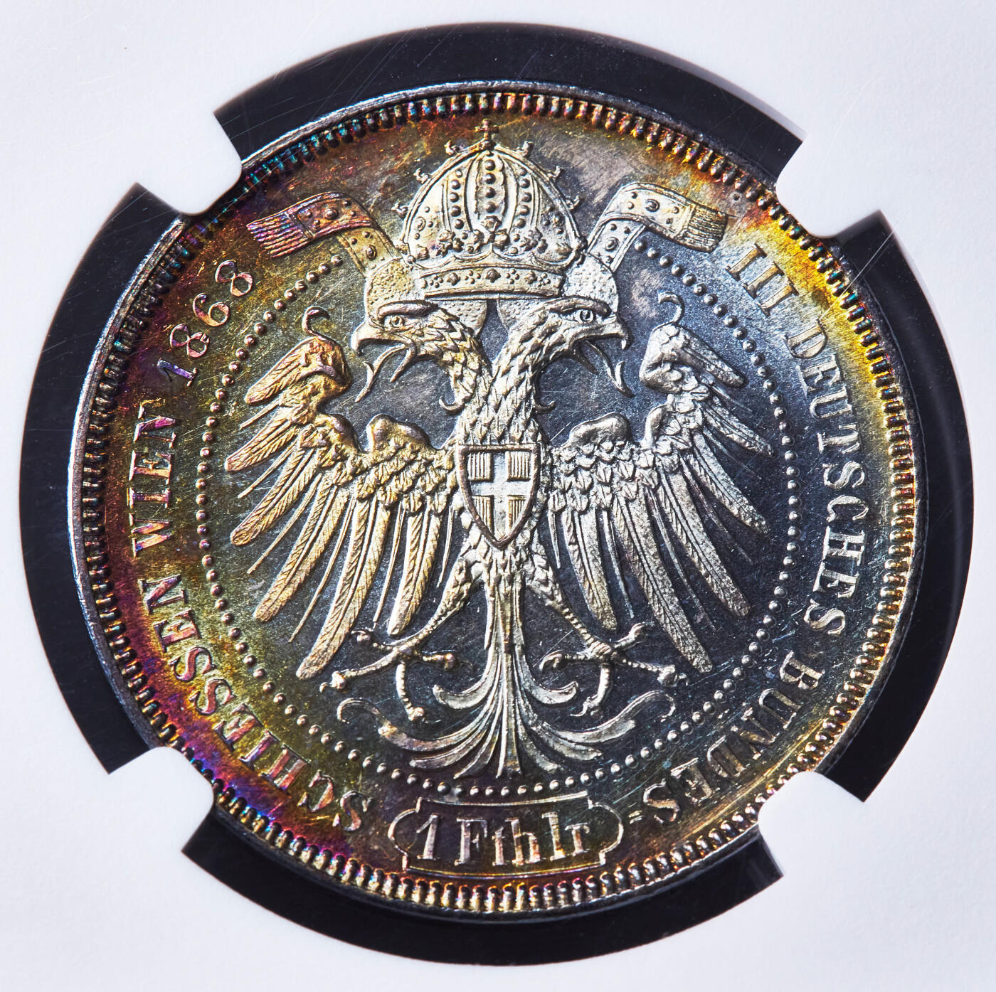 【俄甄集藏】“万象更新、马呈祥瑞”迎新春俄甄精品场-2026年(047)01-21 星期三 晚 19:30 全场包邮 奥匈帝国1868年纪念维也纳德意志地区第三届联邦射击节奥地利女神与橡树1泰勒银币，NGC MS62，五彩酱彩养眼老包浆，底板凝霜感强烈，难得的状态，疑似低评