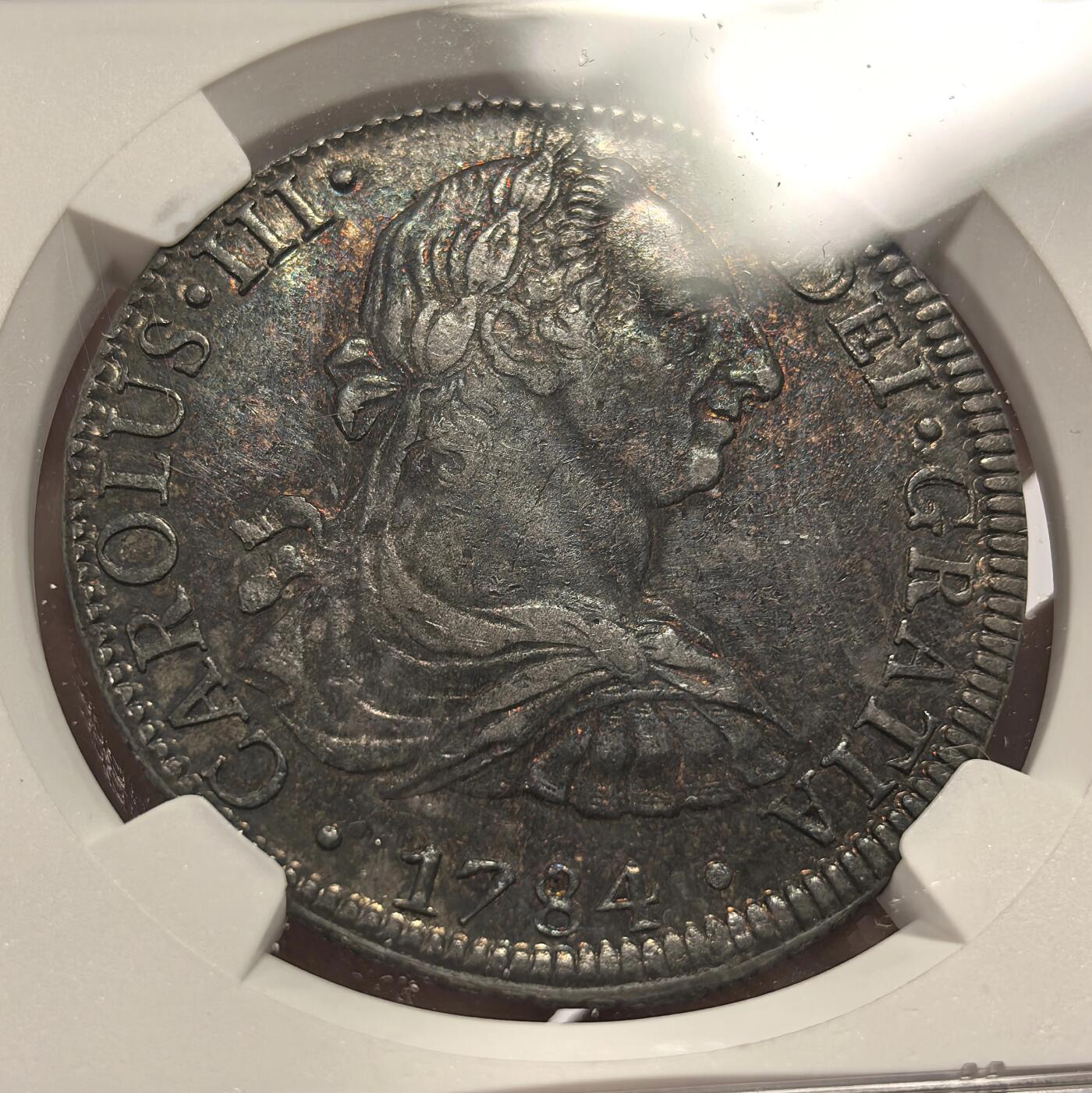 博洋堂世界钱币拍卖第157期（全场包邮） NGC AU 西属墨西哥1784年MO FM卡洛斯三世双柱银币，极美黑彩包浆