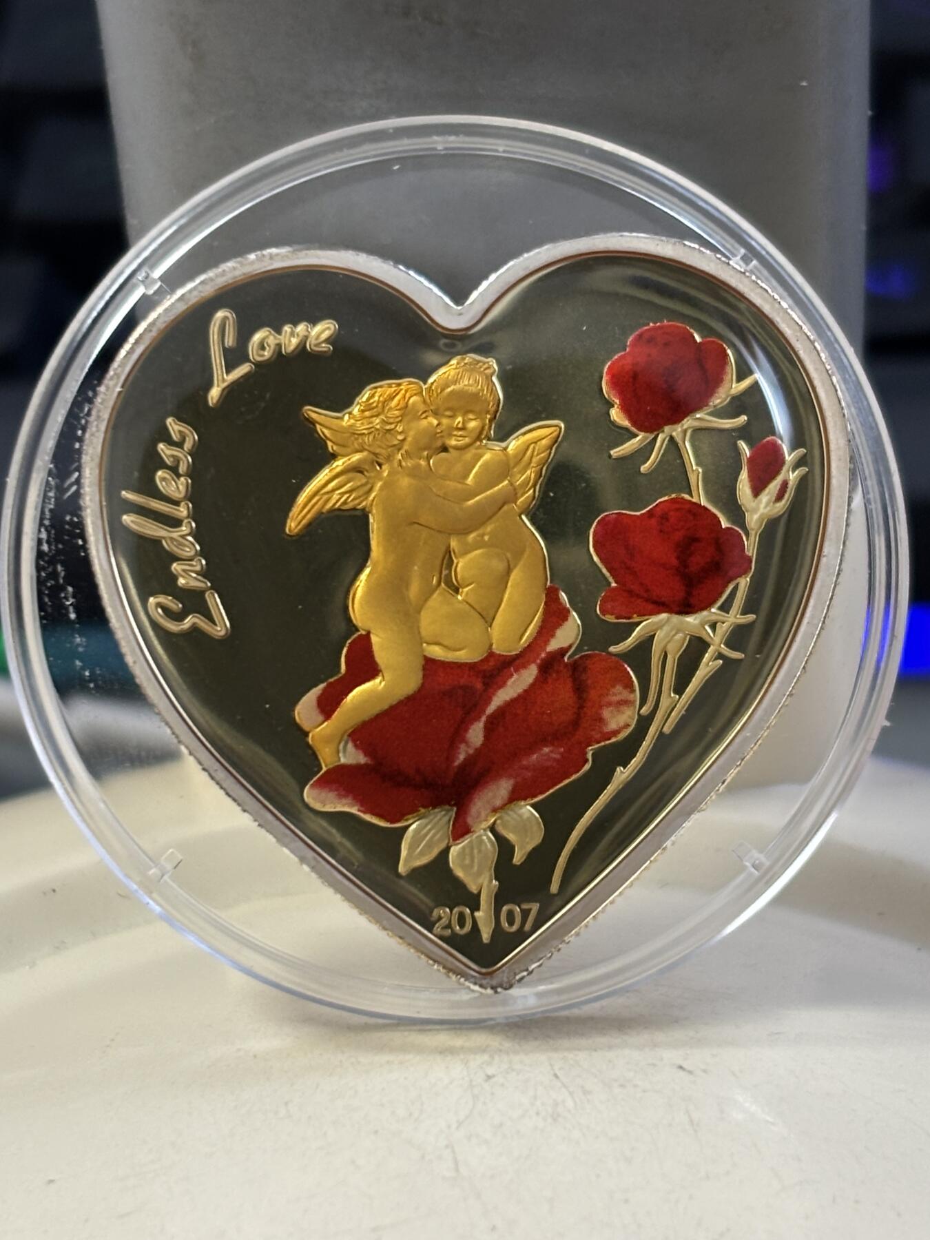 第188期拍卖 帕劳2007年天使玫瑰无尽的爱心形纪念银币，925银，25克，发行2500枚