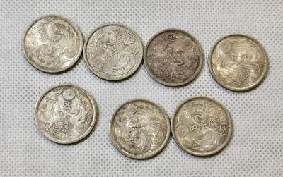 甄臻铺-世界币章拍卖（第48期）精品场拍品征集中，送拍享返佣金等优惠多多 - 日本 双凤五十钱银币 昭和八年第二少的特年 UNC极品七枚一组，品相如图