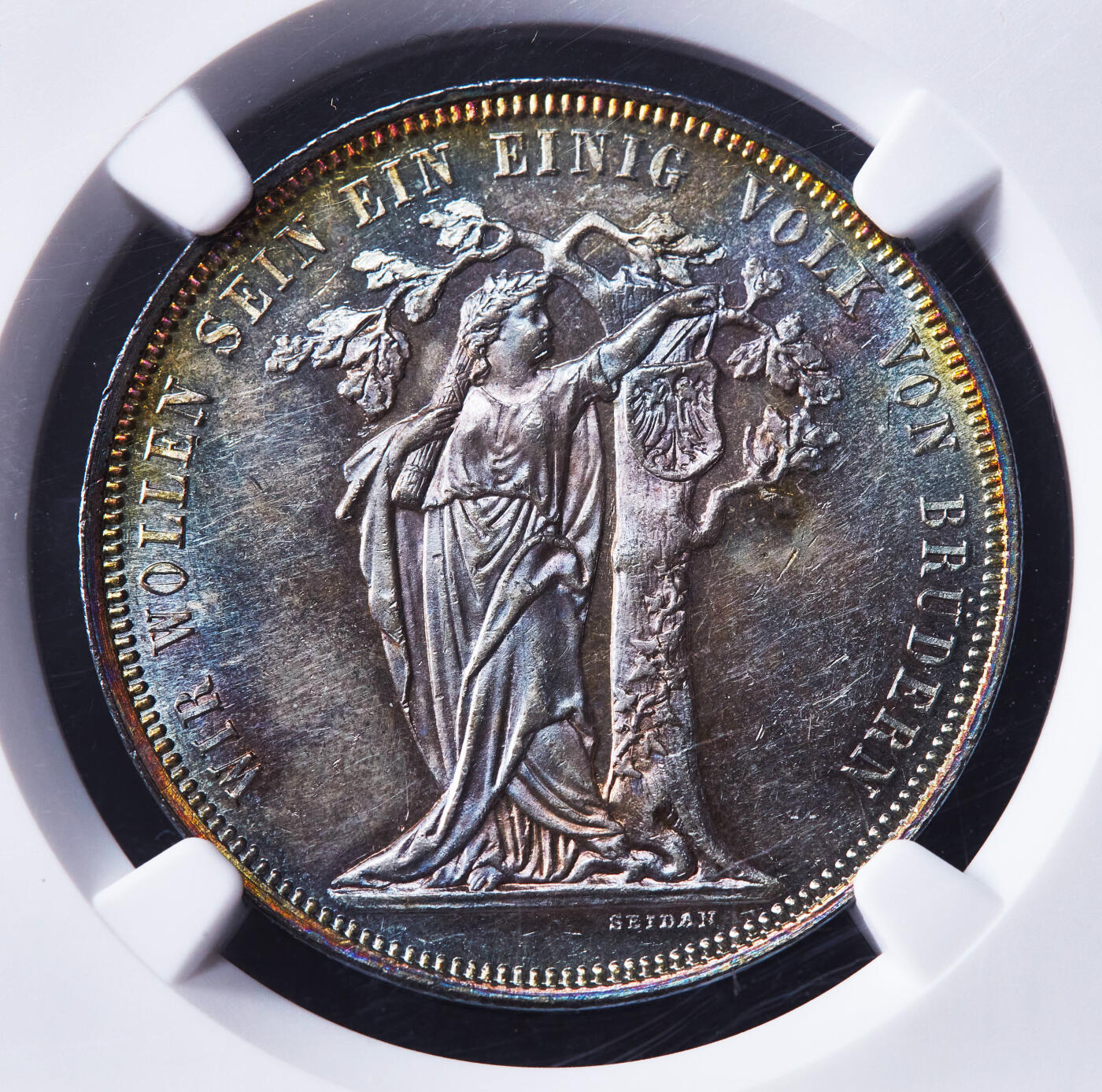 【俄甄集藏】“万象更新、马呈祥瑞”迎新春俄甄精品场-2026年(047)01-21 星期三 晚 19:30 全场包邮 奥匈帝国1868年纪念维也纳德意志地区第三届联邦射击节奥地利女神与橡树1泰勒银币，NGC MS62，五彩酱彩养眼老包浆，底板凝霜感强烈，难得的状态，疑似低评