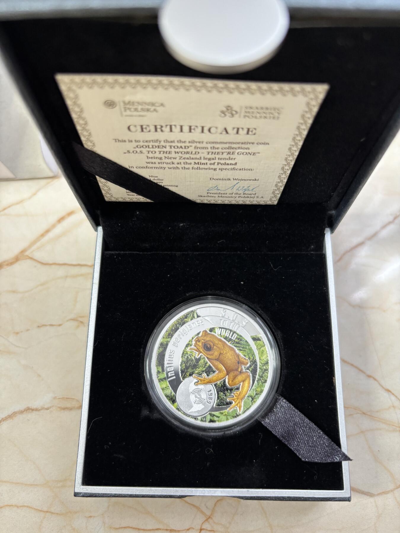 第188期拍卖 纽埃2016年拯救地球SOS系列2金蟾彩色精制银币，17.5克，发行999枚