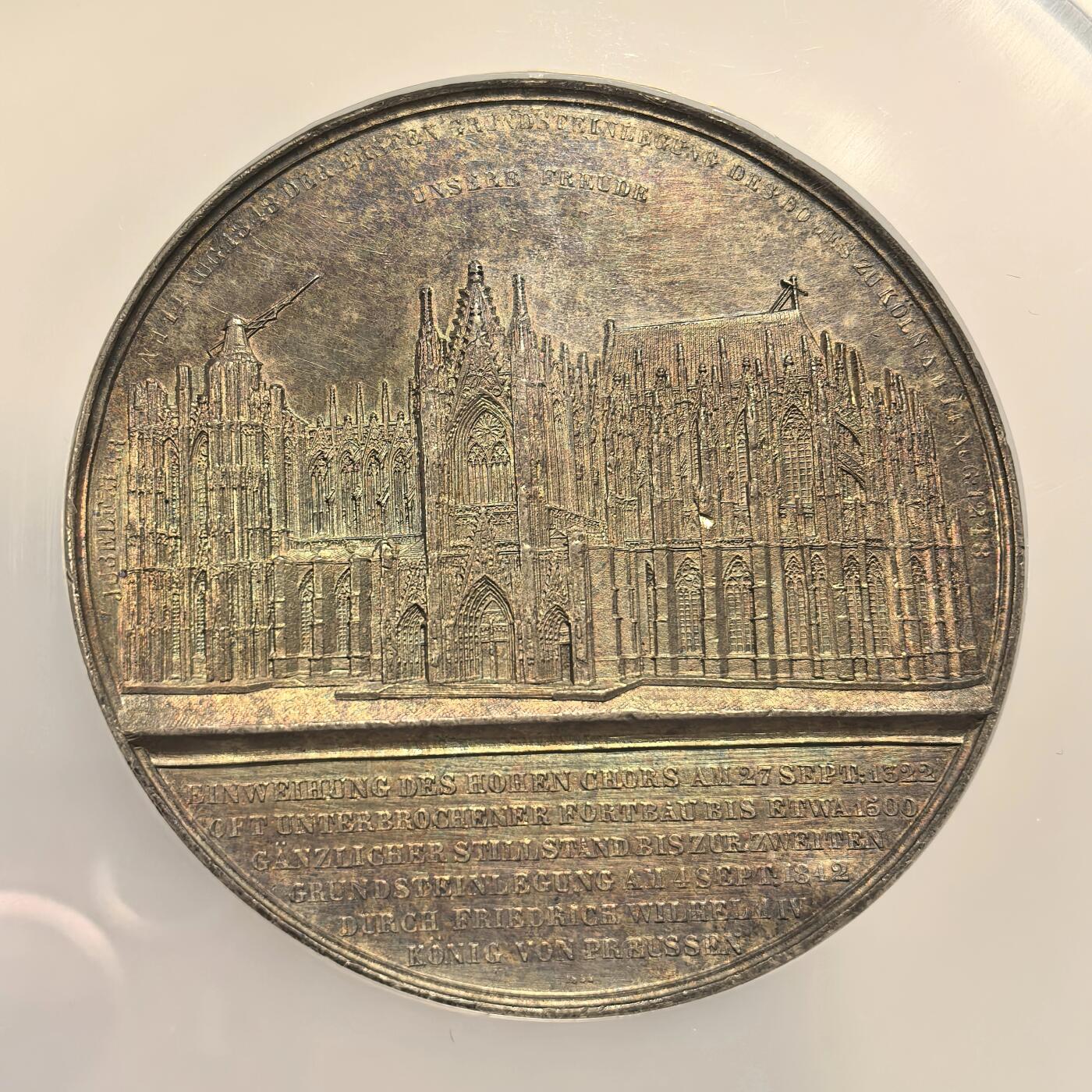 博洋堂世界钱币拍卖第157期（全场包邮） NGC UNC 德国1851年克隆大教堂纪念银章，J.Wiener代表作大教堂系列之一，直径59mm。科隆大教堂建于1248-1880年，耗时超过600年，二战时经历空袭，有14处严重受损创面，反面内容是十九世纪维修的场景。