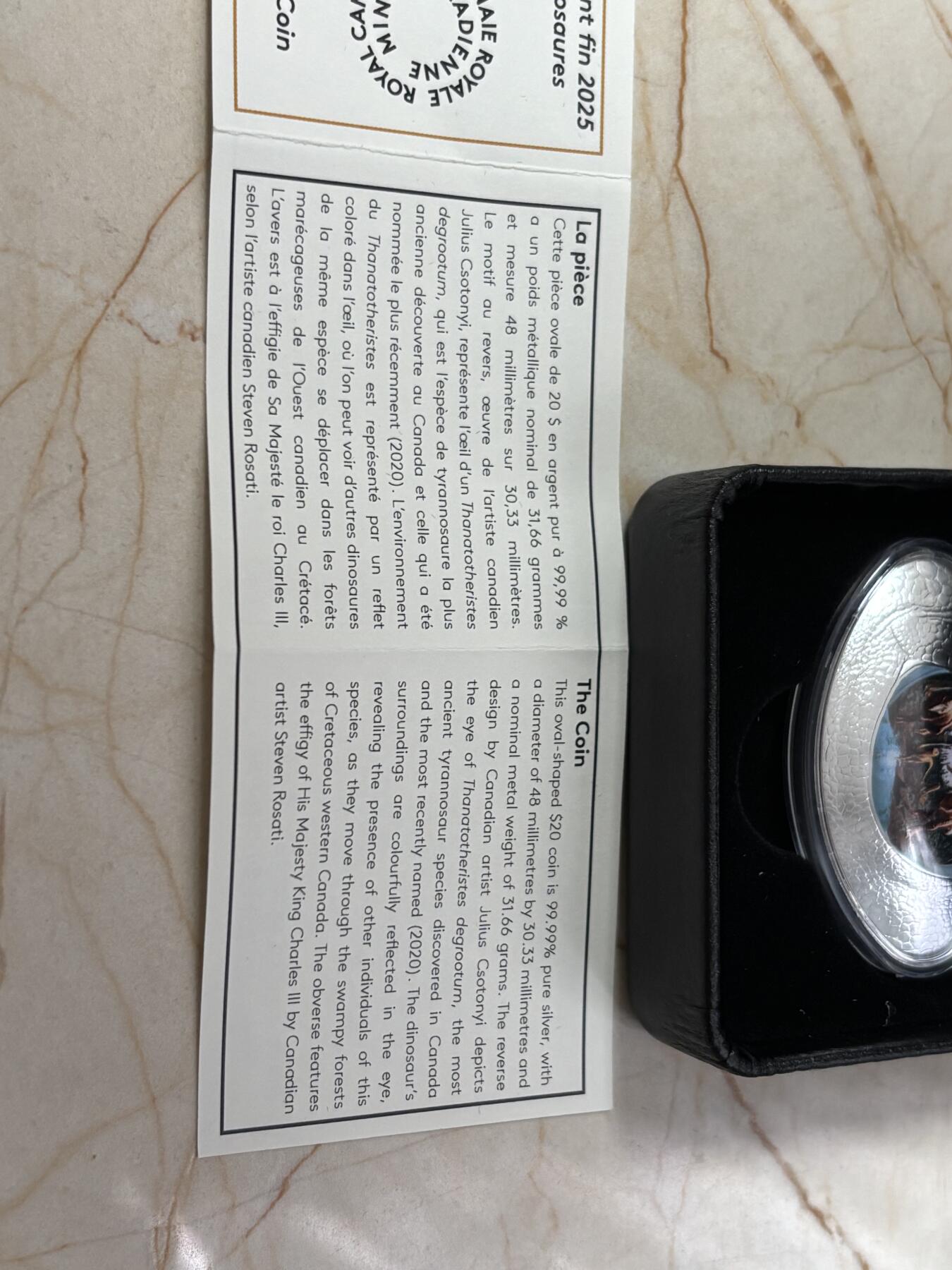 第188期拍卖 加拿大2025年恐龙之眼系列塔纳托龙1盎司椭圆形彩色银币，999银，发行8500枚