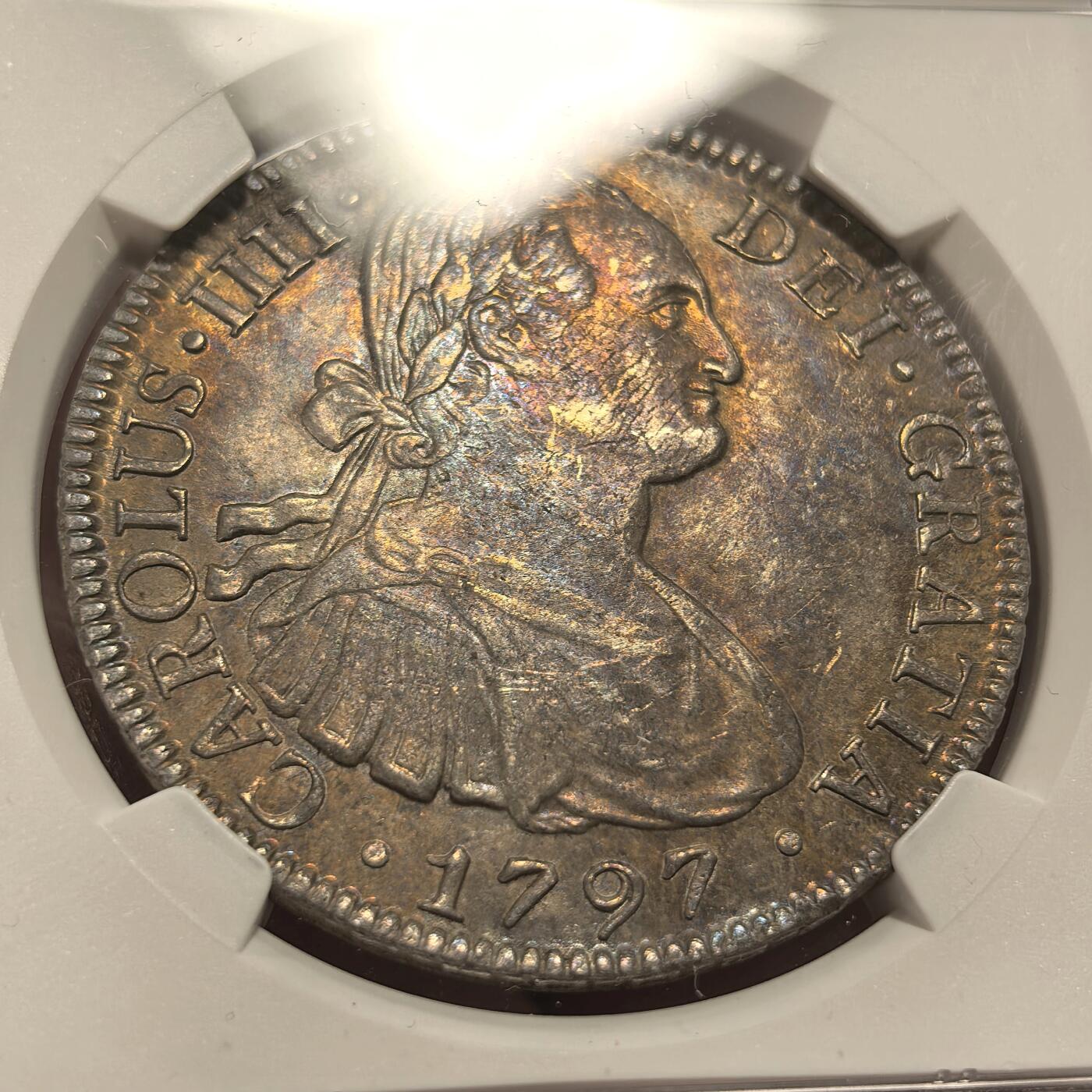 博洋堂世界钱币拍卖第157期（全场包邮） NGC AU 西属墨西哥1797年FO FM卡洛斯四世双柱银币，底板五彩包浆