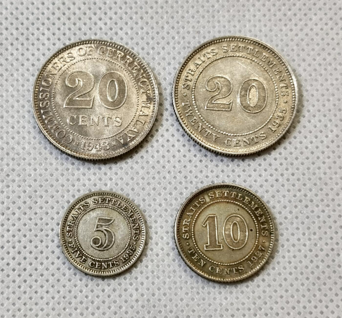 甄臻铺-世界币章拍卖（第48期）精品场拍品征集中，送拍享返佣金等优惠多多 四枚一组，乔五海峡银币五分、十分、20分，unc状态；乔六海峡20分，63-64状态