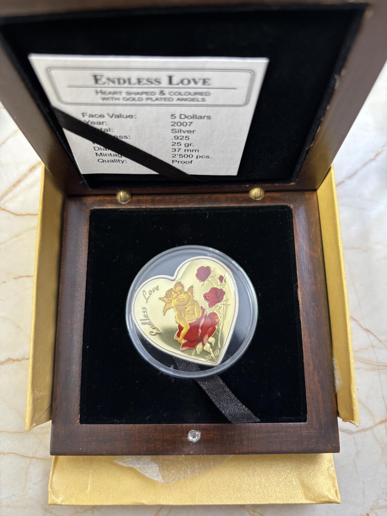 第188期拍卖 帕劳2007年天使玫瑰无尽的爱心形纪念银币，925银，25克，发行2500枚