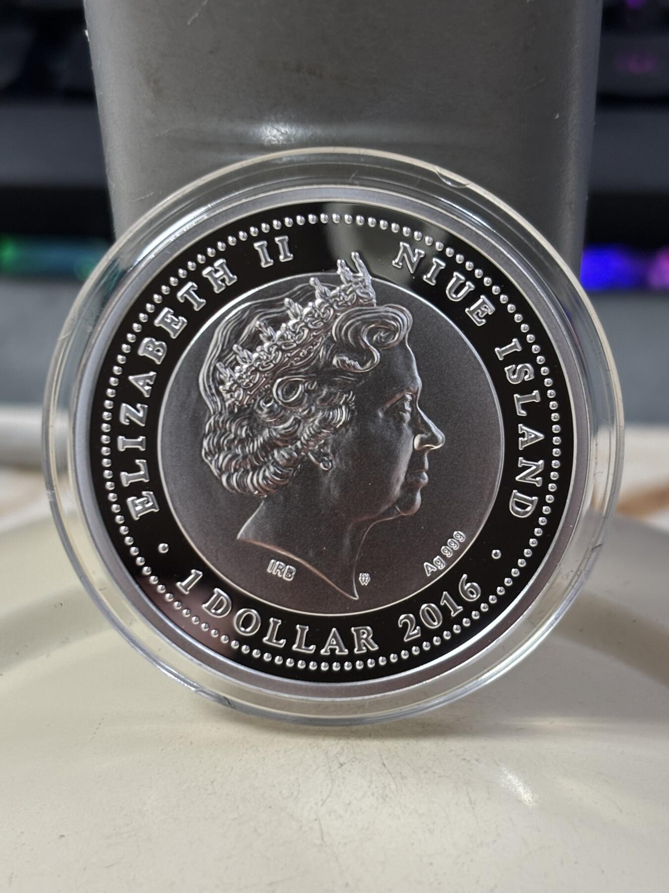 第188期拍卖 纽埃2016年拯救地球SOS系列2金蟾彩色精制银币，17.5克，发行999枚