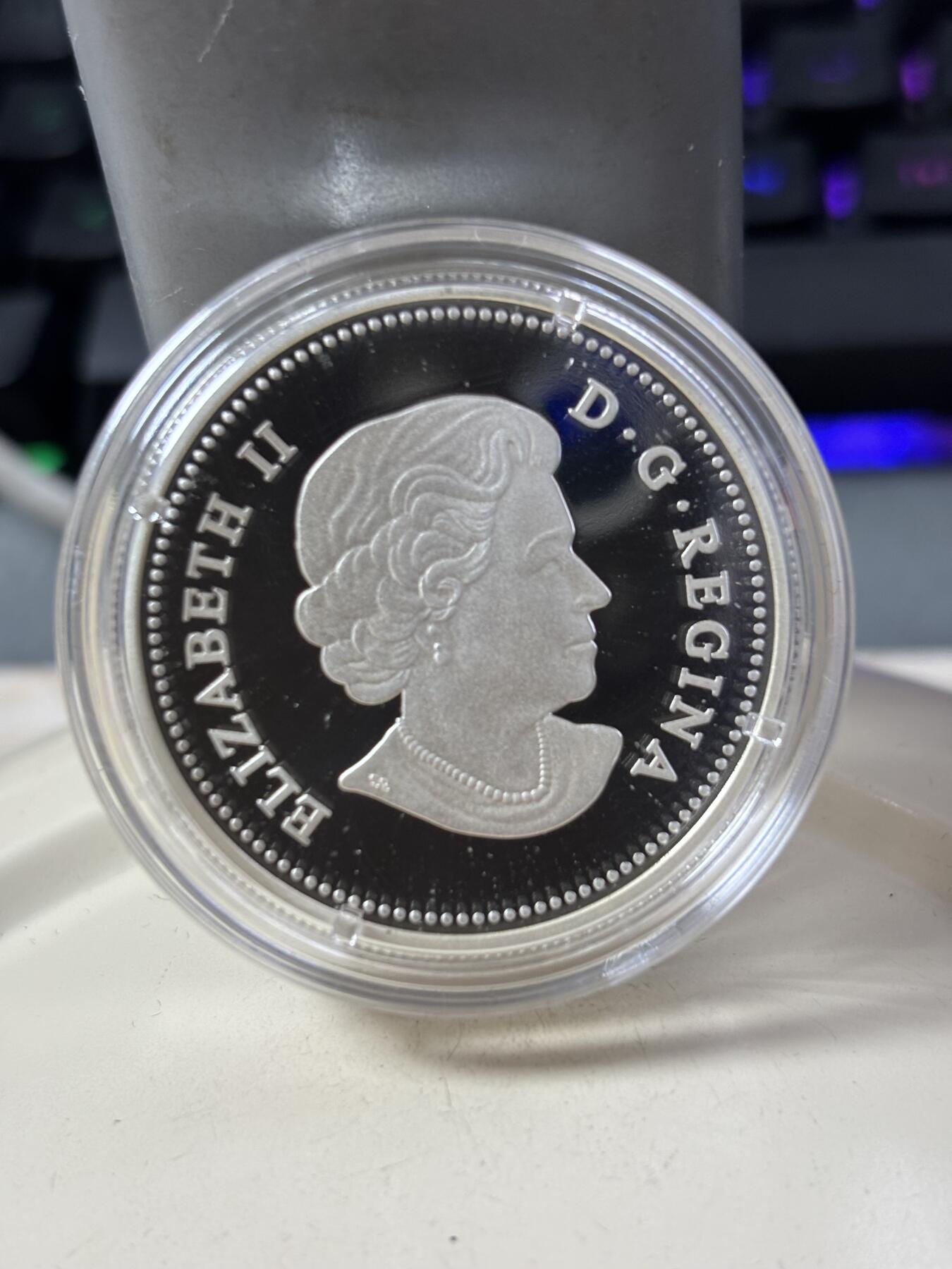 第188期拍卖 加拿大2015年圣诞节系列麋鹿镶嵌黄水晶银币,9999银，1盎司，发行量7500枚