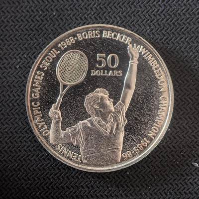 道一币馆币章第一百六十三场 - 纽埃1987年汉城奥运会-网球运动员鲍里斯·贝克尔50元银币 27g 625s
