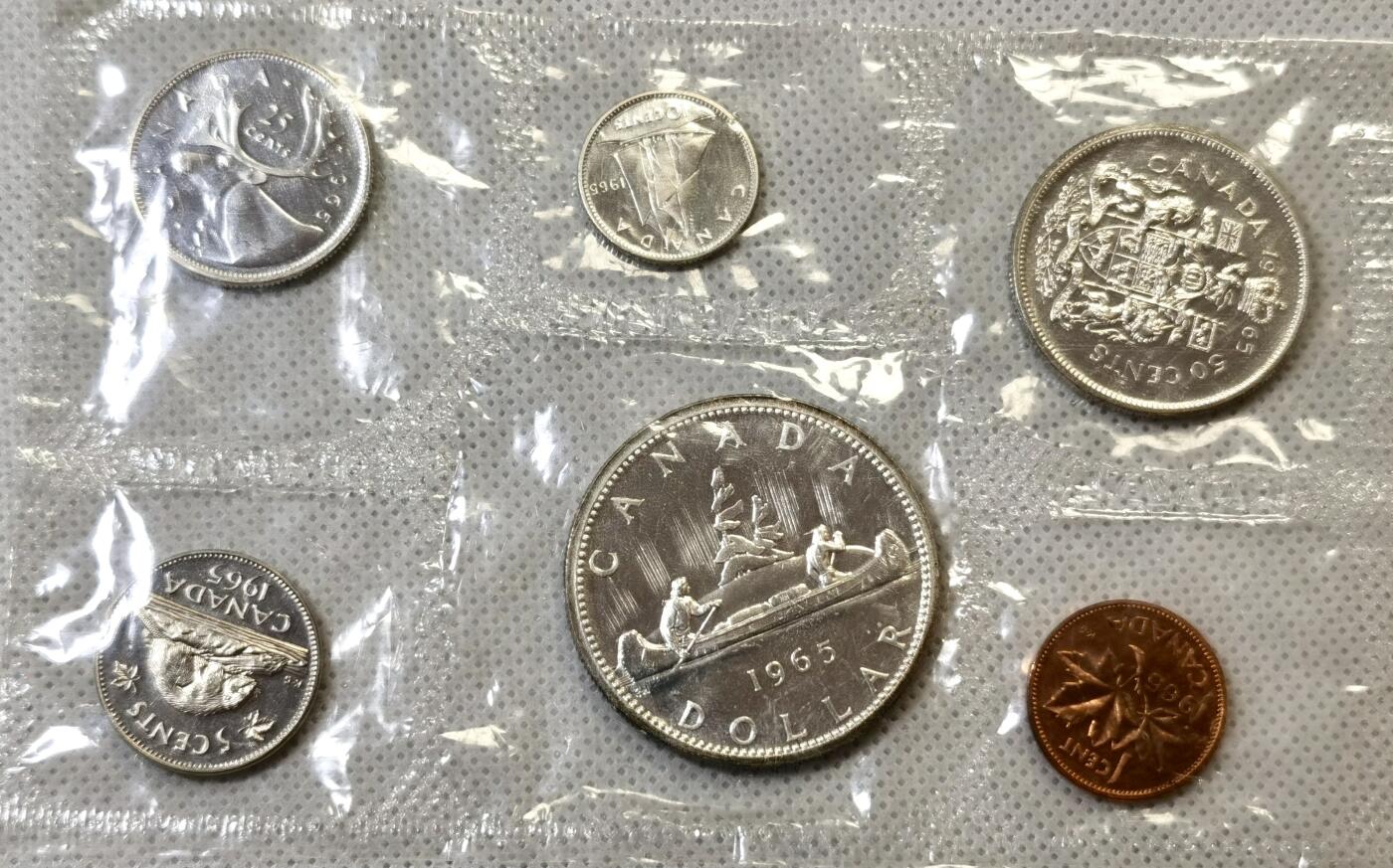 甄臻铺-世界币章拍卖（第48期）精品场拍品征集中，送拍享返佣金等优惠多多 加拿大1965年套币，原封状态品相完好，800银，合计含纯银34g左右，品相如图