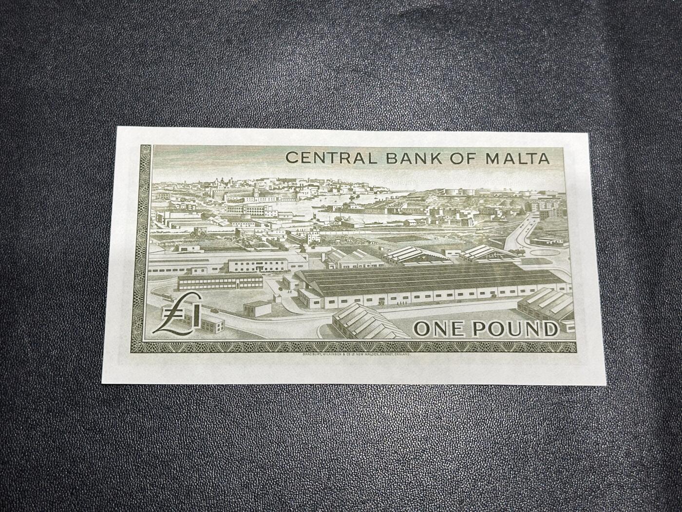 《外钞收藏家》第六百零三期（精选场）（本平台长期征集拍品、欢迎藏友们联系合作） 1967年马耳他1镑 UNC- 精美戎装女王