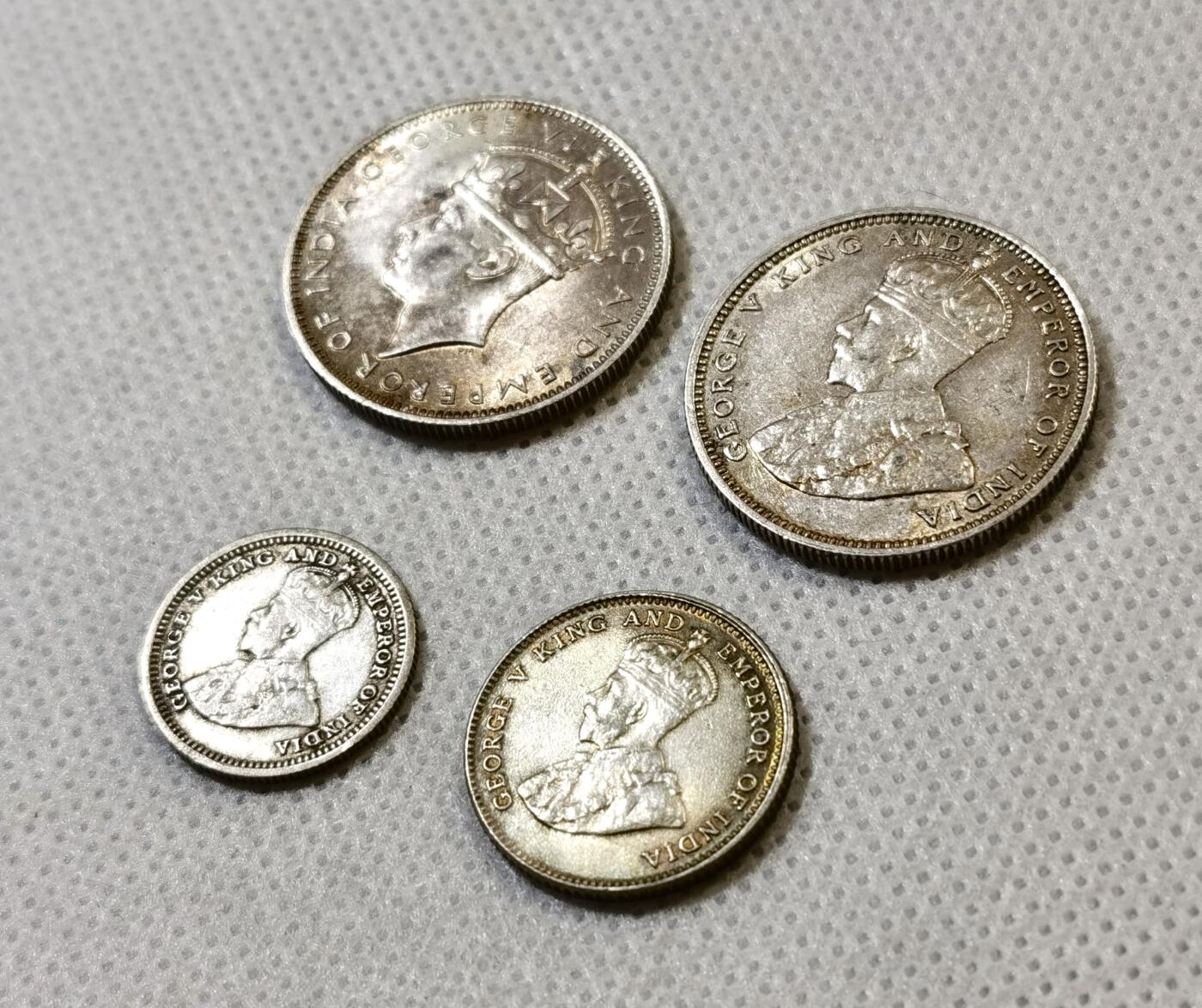 甄臻铺-世界币章拍卖（第48期）精品场拍品征集中，送拍享返佣金等优惠多多 四枚一组，乔五海峡银币五分、十分、20分，unc状态；乔六海峡20分，63-64状态