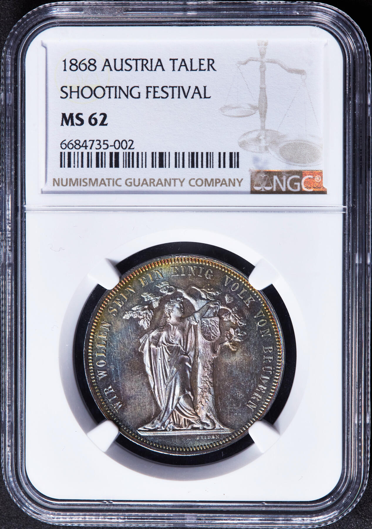 【俄甄集藏】“万象更新、马呈祥瑞”迎新春俄甄精品场-2026年(047)01-21 星期三 晚 19:30 全场包邮 奥匈帝国1868年纪念维也纳德意志地区第三届联邦射击节奥地利女神与橡树1泰勒银币，NGC MS62，五彩酱彩养眼老包浆，底板凝霜感强烈，难得的状态，疑似低评