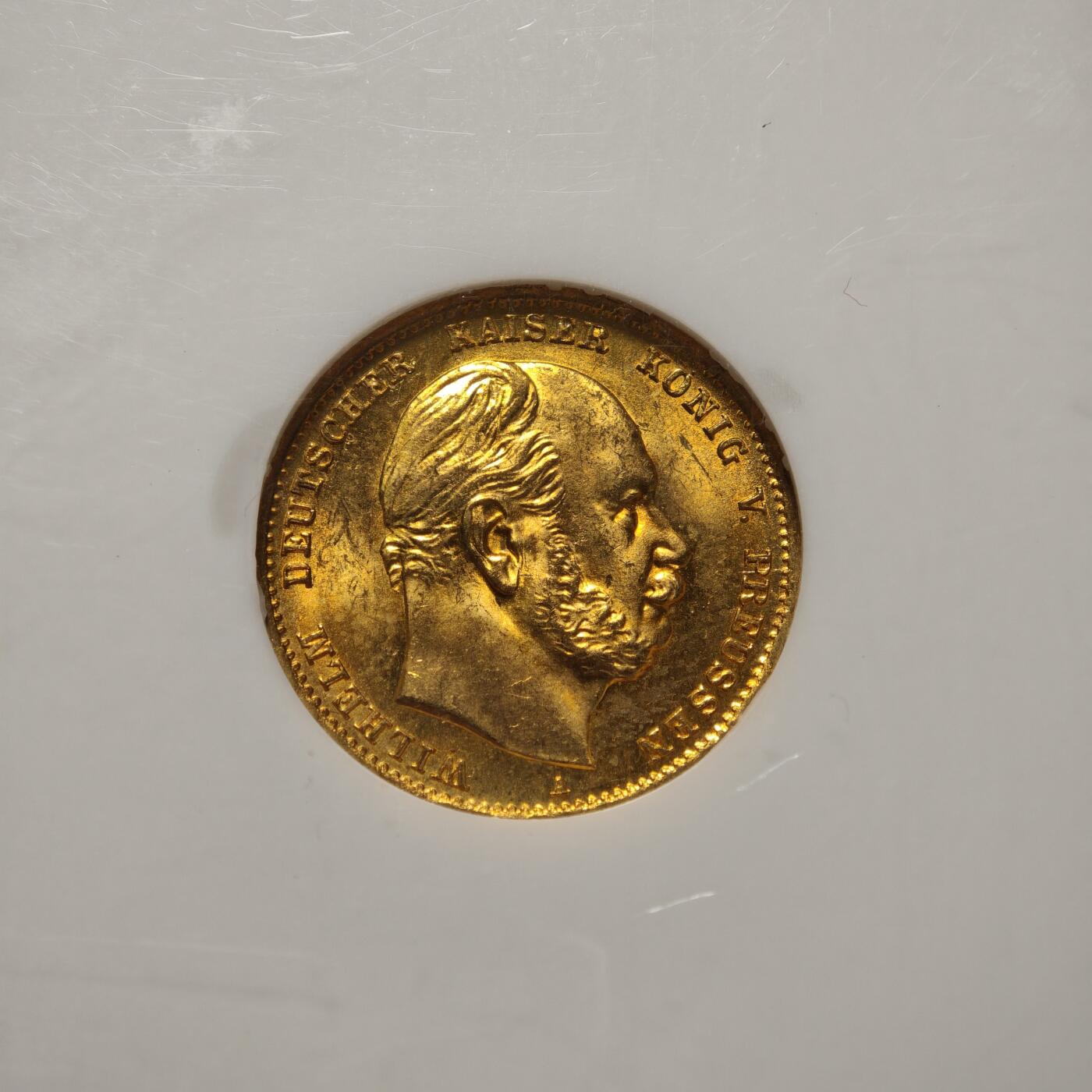 【德藏】世界币章拍卖第162期（拍品征集中~欢迎藏友联系） 1872年 德国普鲁士威廉一世A版10马克金币，德意志帝国首版流通金马克，重量：3.982克，含金量：90%，NGC MS65分 德国柏林铸币厂铸造，德国金本位时代的第一枚钱币，短翅金马克，具有很高的历史价值。NGC老白盒，早期低评