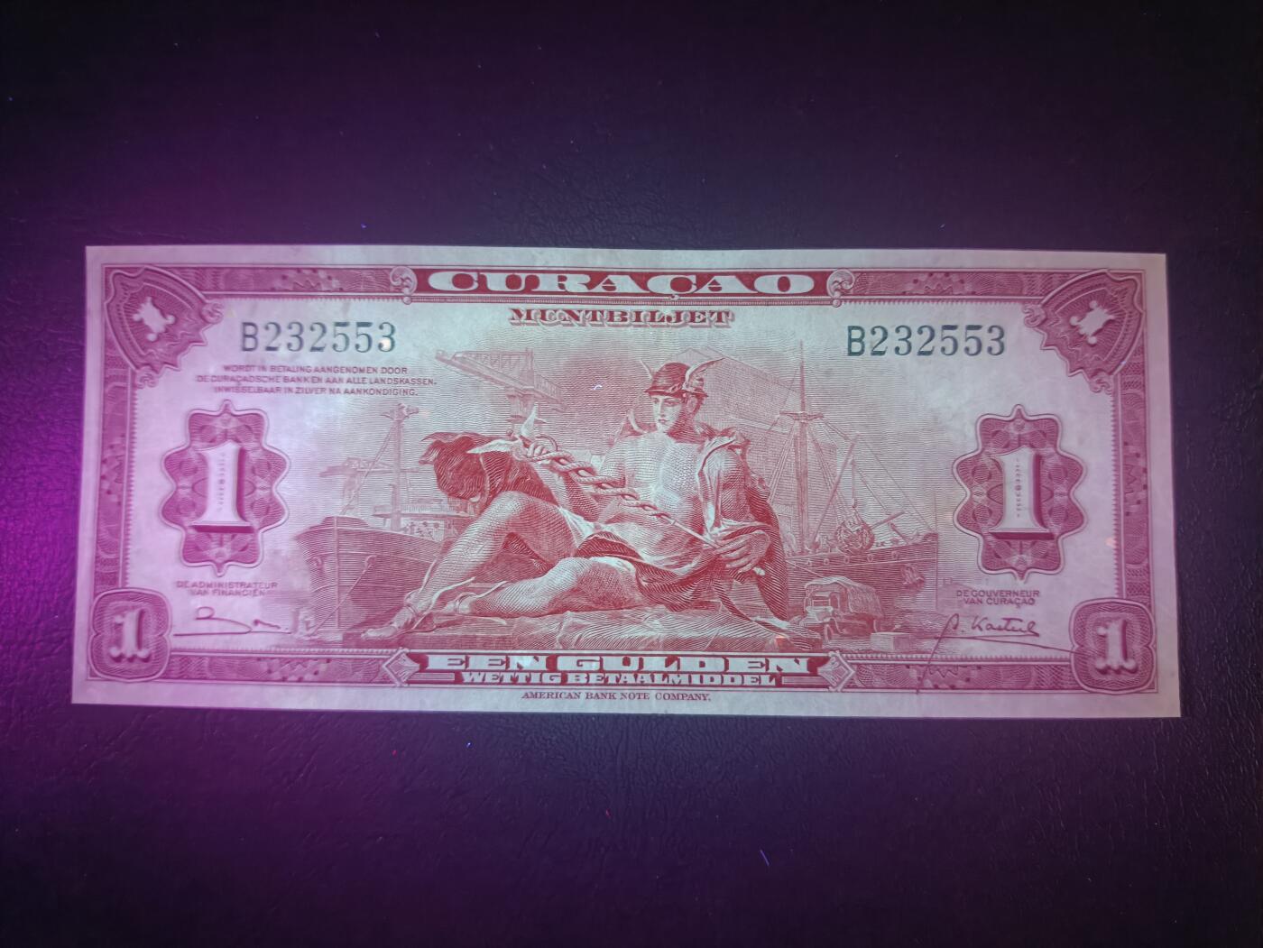 2026一月第三期，总213期 荷属库拉索1947年1盾AUNC无47，轮船环绕的商业神墨丘利和总督府徽章，稀有荷属领地品种