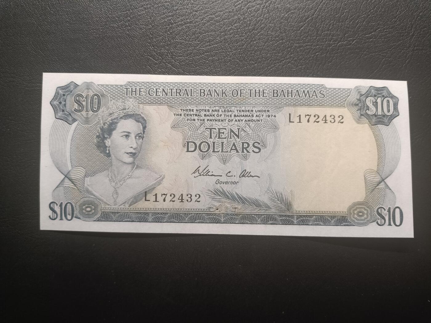 2026一月第三期，总213期 巴哈马1974版10元AUNC，后期“巴哈马中央银行”抬头，稀有的中高面值，大冠女王和火烈鸟，德纳罗公司水粉画风格的唯美彩背