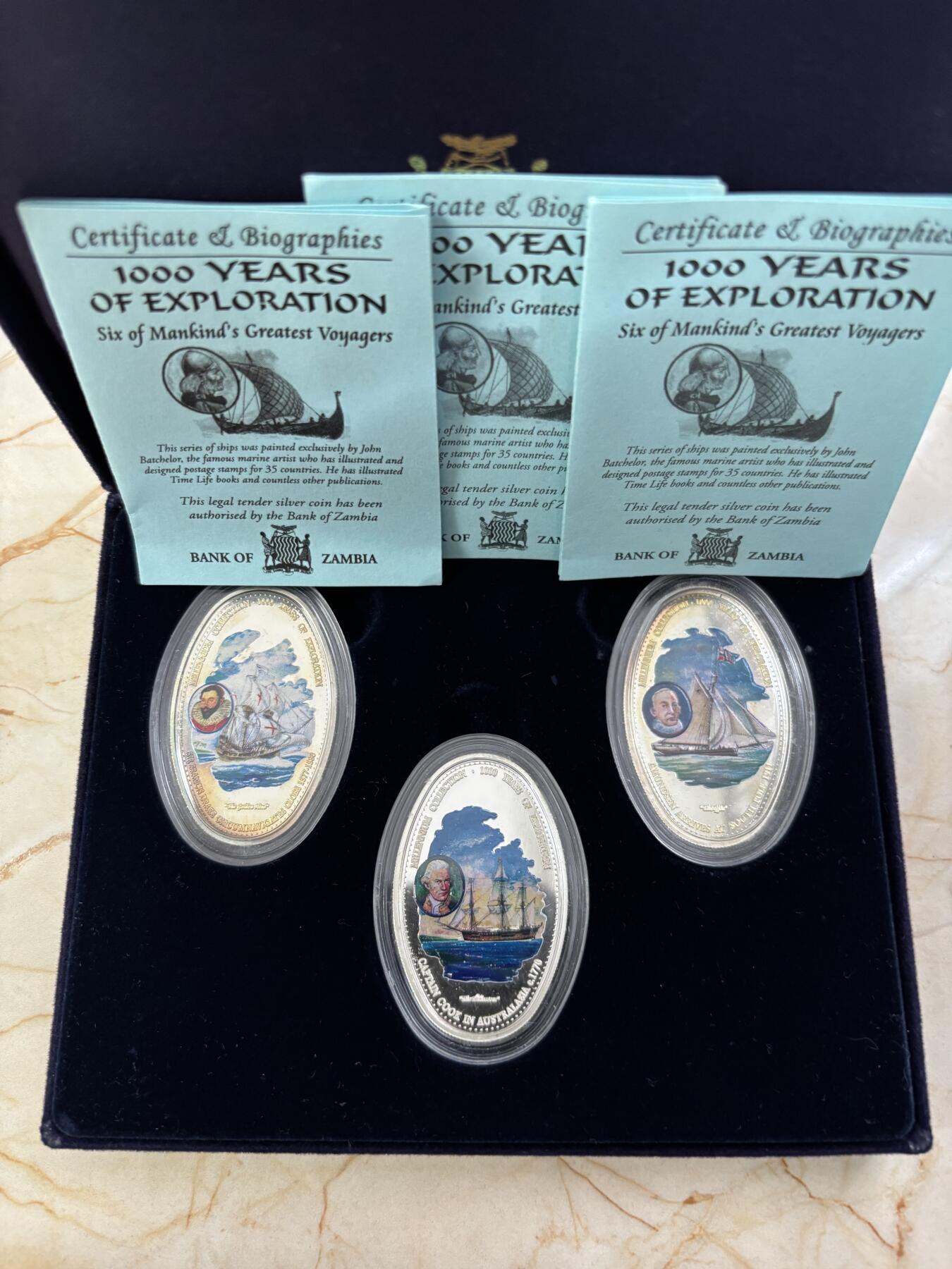第188期拍卖 赞比亚2000年人类航海千年2椭圆形彩色精制纪念银币3枚套，20克*3,925银，发行15000套，有氧化