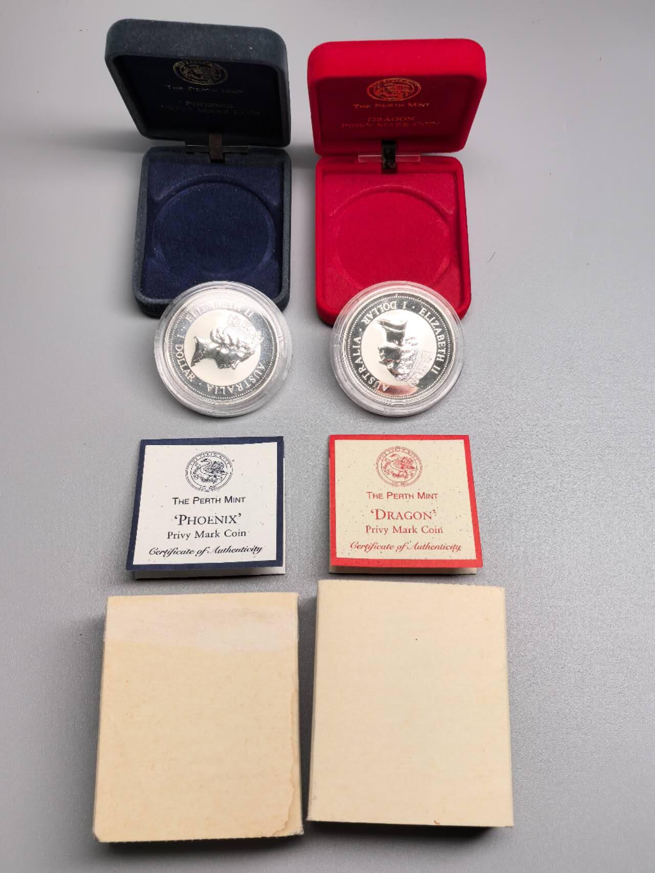 小驴勋章奖章收藏1月17日周六晚六点拍卖（珍爱和平，收藏战争，铭记历史，勿忘国耻，忠党爱国。有偿代拍，送拍规则在简介最后，参拍须阅读规则后再参拍，关系到运费包装发货时效真假辨别等关键信息，拍卖时不再发原图，看大图店主微信码在拍卖店铺介绍里） 澳大利亚一盎司龙凤镶金翠鸟图案纯银银币一对，带盒带证书