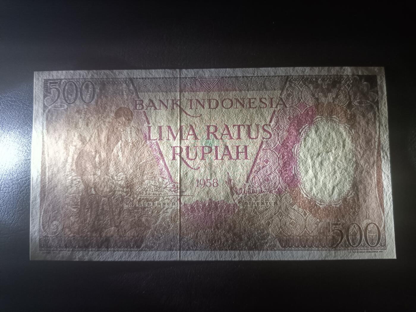 2026一月第三期，总213期 印度尼西亚1958版500卢比UNC无47，椰子采摘和传统民居，稀有品种