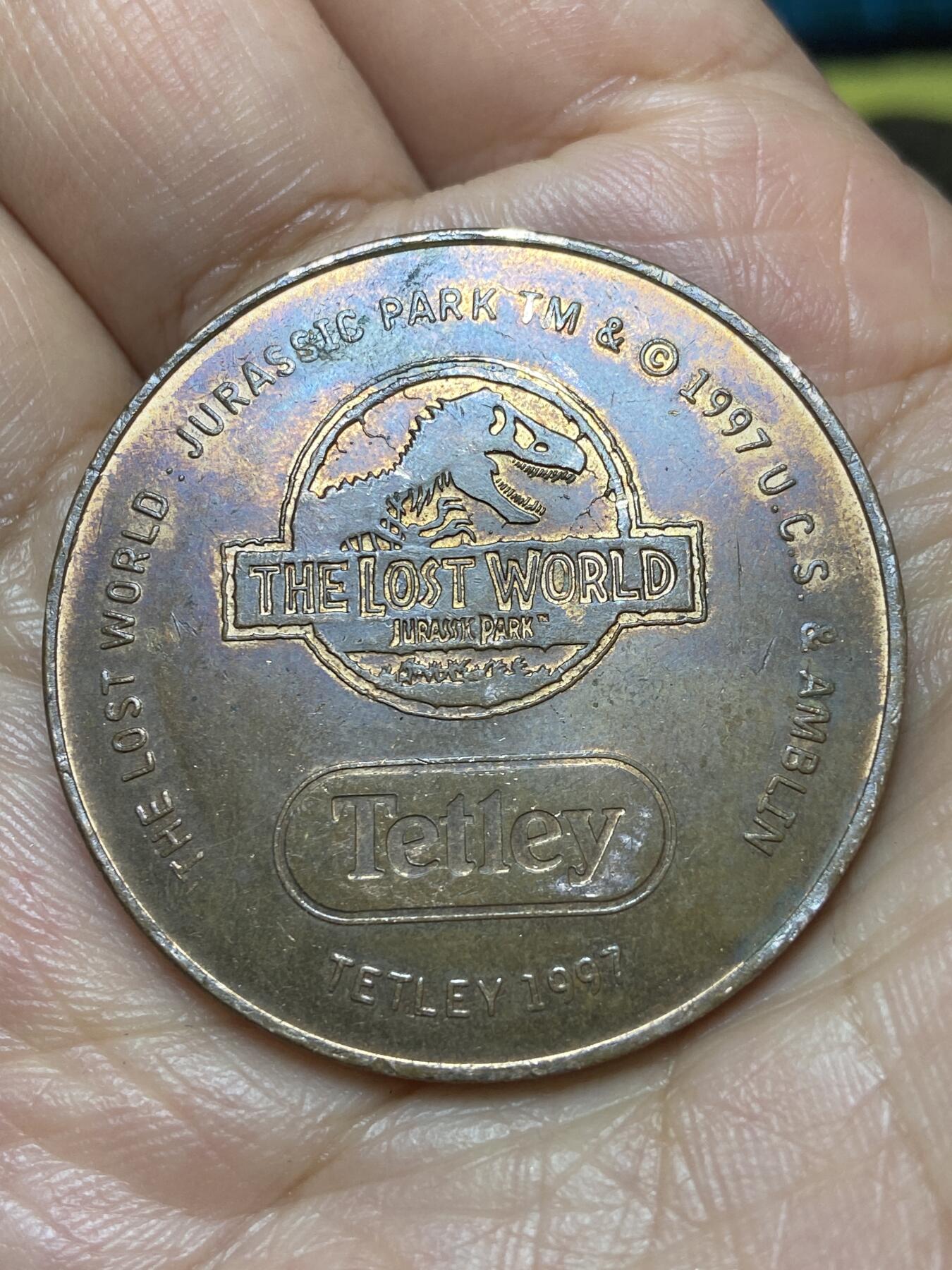 2026年第九场(总第一百七十八场）外国好品散币场(免佣金) 英国🇬🇧1997年侏罗纪公园主题纪念章(英国Tetley茶业公司和侏罗纪公园失落的世界联动纪念章，美颌龙图案)