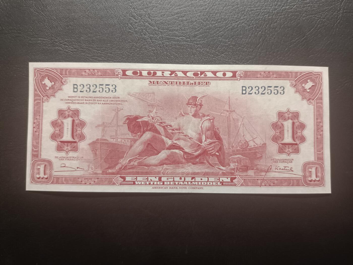 2026一月第三期，总213期 荷属库拉索1947年1盾AUNC无47，轮船环绕的商业神墨丘利和总督府徽章，稀有荷属领地品种