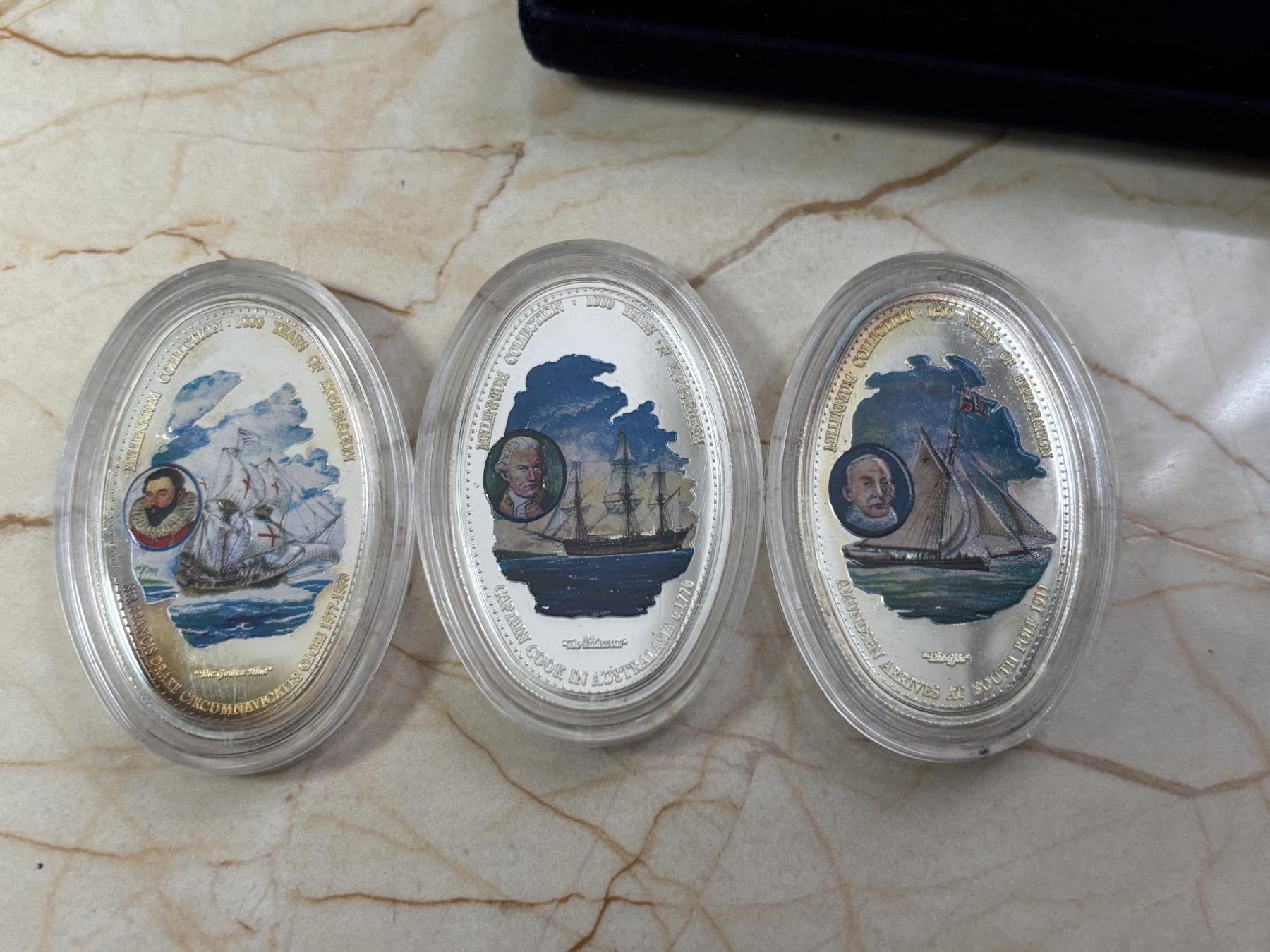 第188期拍卖 赞比亚2000年人类航海千年2椭圆形彩色精制纪念银币3枚套，20克*3,925银，发行15000套，有氧化