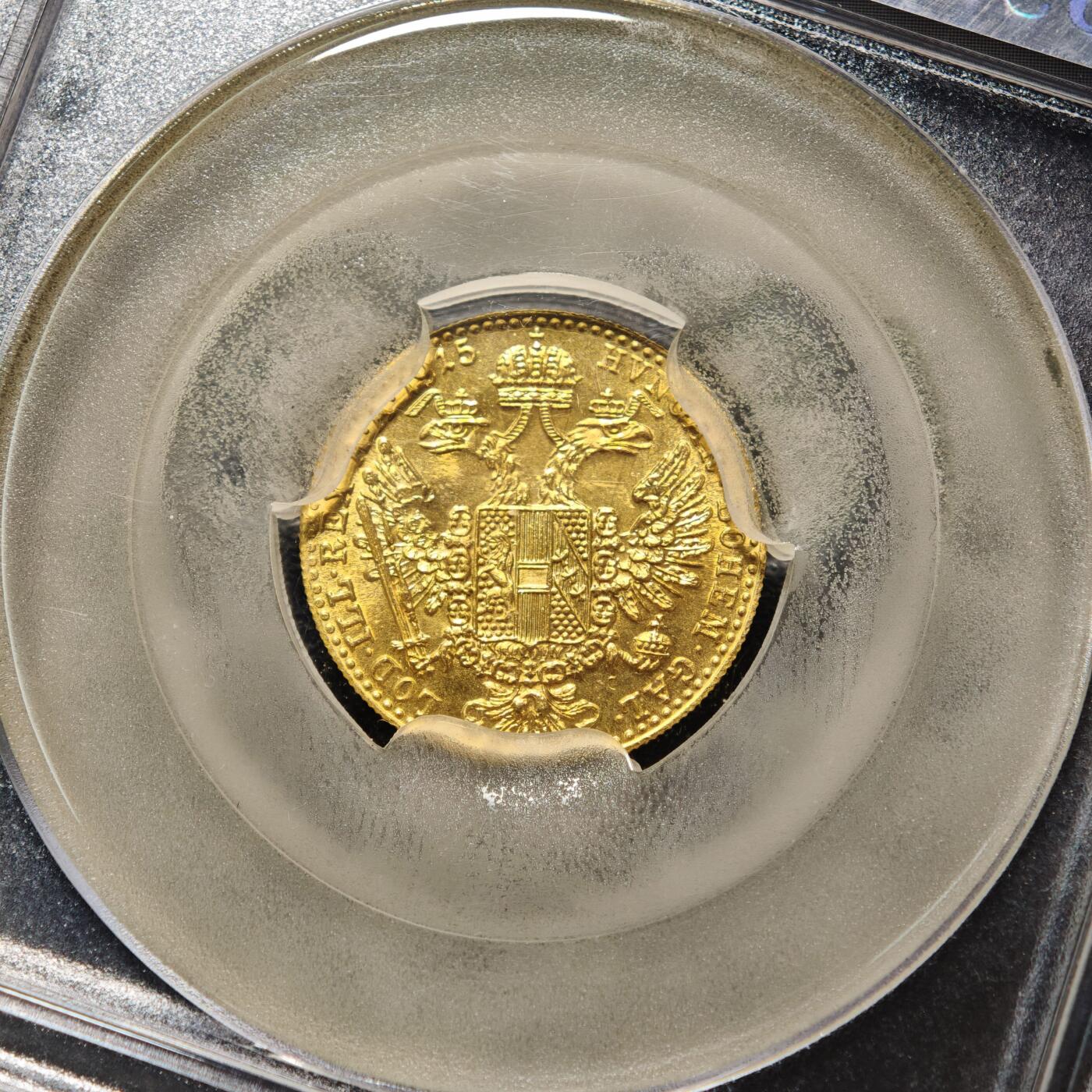 【德藏】世界币章拍卖第162期（拍品征集中~欢迎藏友联系） 1915年 奥匈帝国弗朗茨·约瑟夫一世1杜卡特金币，重量：3.5克左右，含金量：98.6%，ACGA(美国评级公司) MS65 1915年是奥匈帝国最后一年铸造金币，1916、1917年因一战困境没有铸造，1918年奥匈帝国解体，因此，具有较高的历史价值