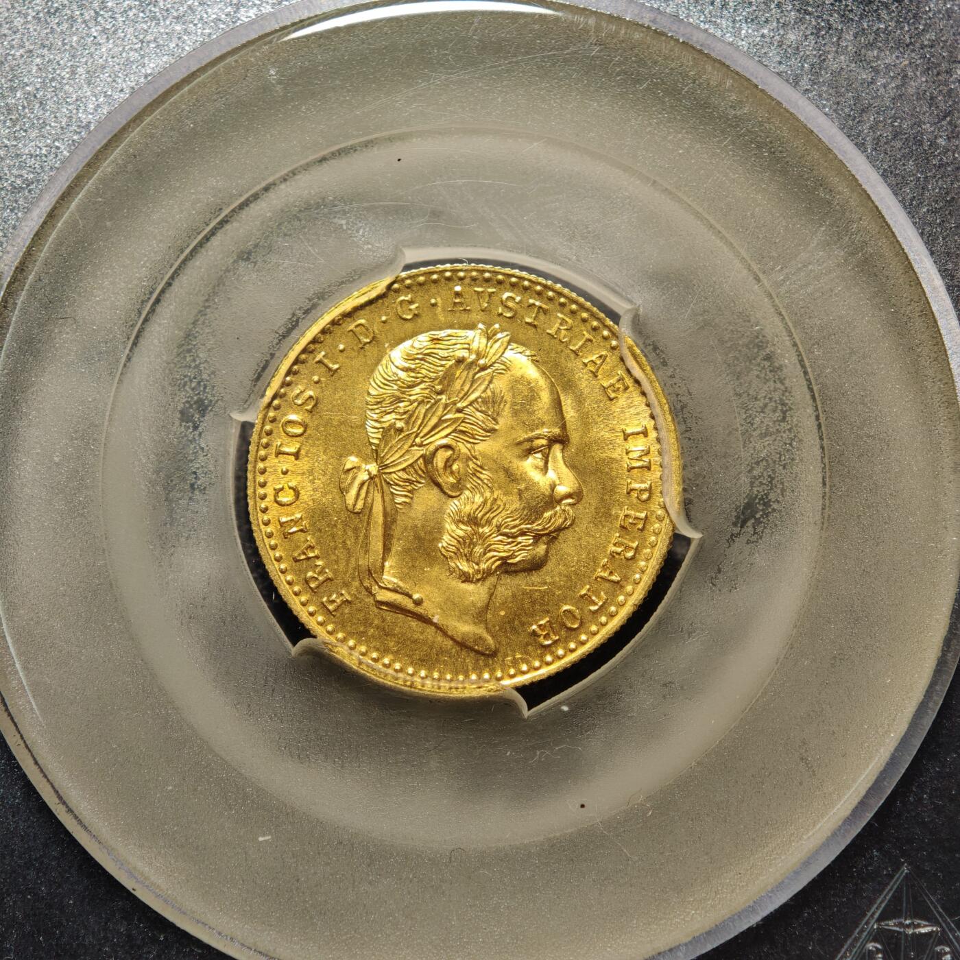 【德藏】世界币章拍卖第162期（拍品征集中~欢迎藏友联系） 1915年 奥匈帝国弗朗茨·约瑟夫一世1杜卡特金币，重量：3.5克左右，含金量：98.6%，ACGA(美国评级公司) MS65 1915年是奥匈帝国最后一年铸造金币，1916、1917年因一战困境没有铸造，1918年奥匈帝国解体，因此，具有较高的历史价值