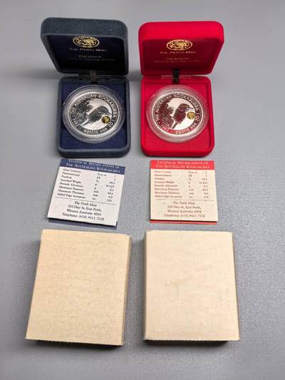 小驴勋章奖章收藏1月17日周六晚六点拍卖（珍爱和平，收藏战争，铭记历史，勿忘国耻，忠党爱国。有偿代拍，送拍规则在简介最后，参拍须阅读规则后再参拍，关系到运费包装发货时效真假辨别等关键信息，拍卖时不再发原图，看大图店主微信码在拍卖店铺介绍里） - 澳大利亚一盎司龙凤镶金翠鸟图案纯银银币一对，带盒带证书