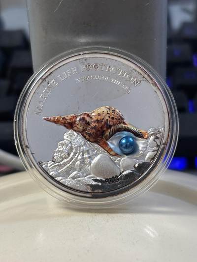 第188期拍卖 - 帕劳2016年珍珠系列镶嵌天然珍珠彩色1盎司精制银币，999银，发行2500枚，有瑕疵