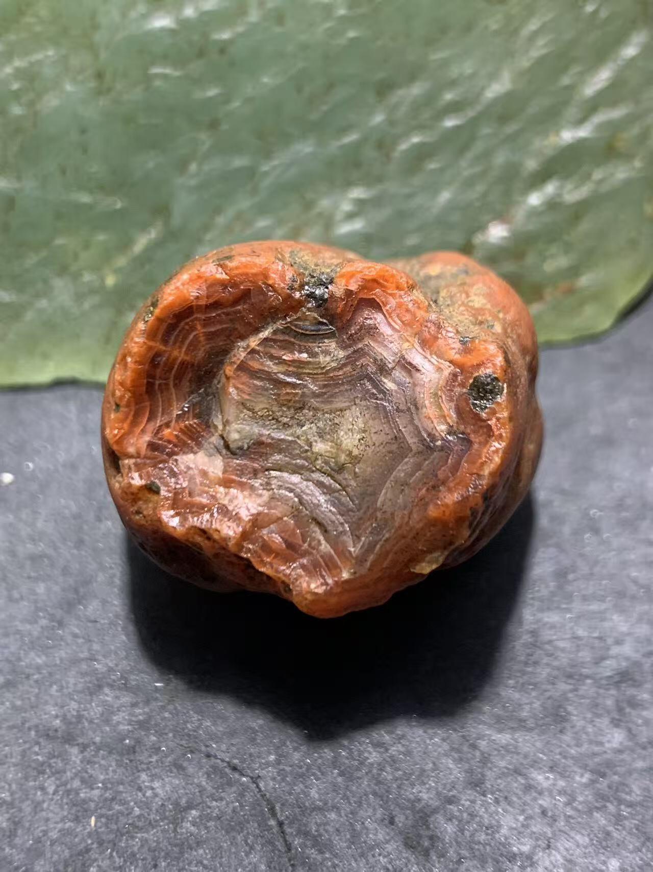 精美红皮原皮开窗料南红玛瑙原石一颗，