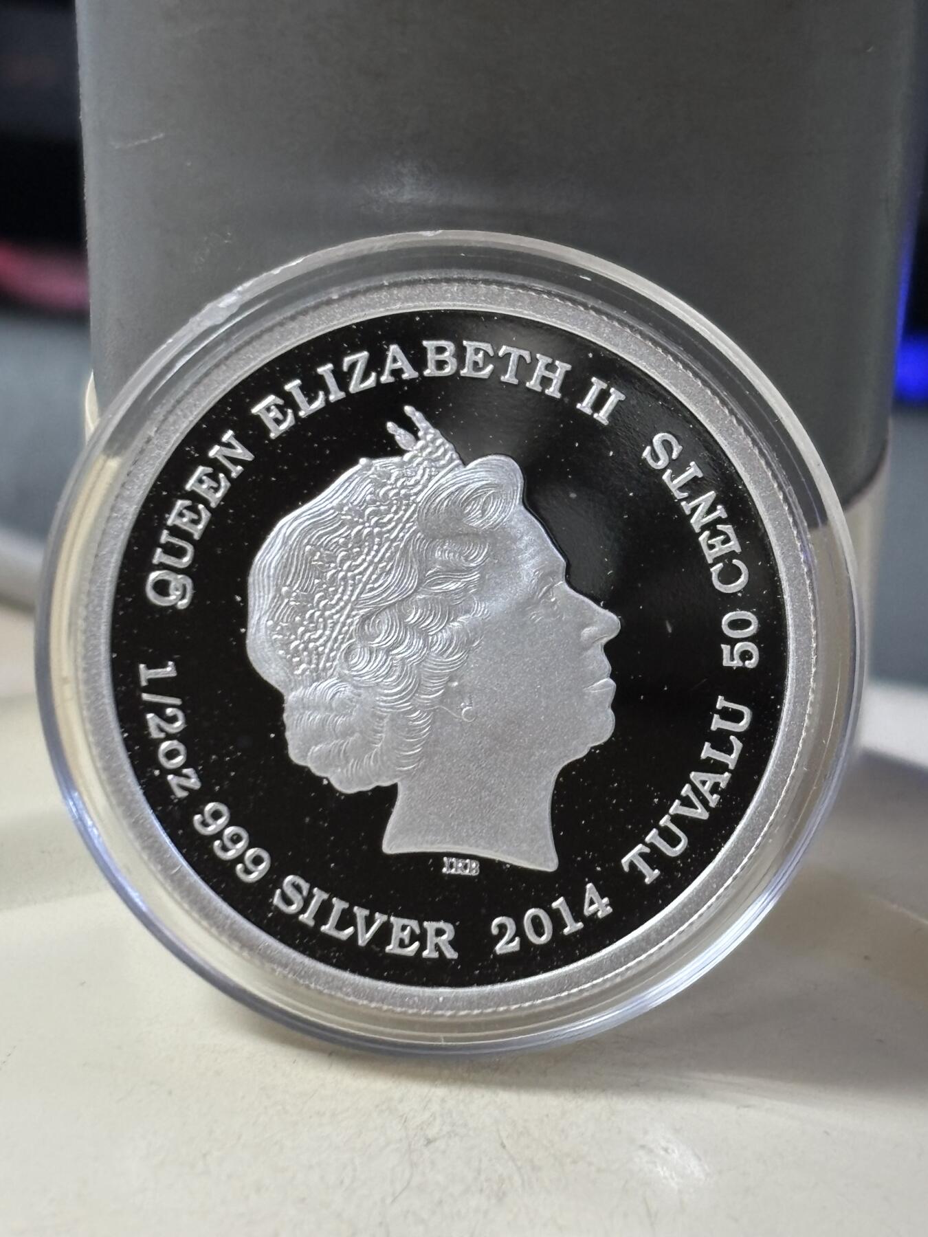 第188期拍卖 卡册图瓦卢2014年1/2盎司初生宝宝彩色纪念银币，999银，