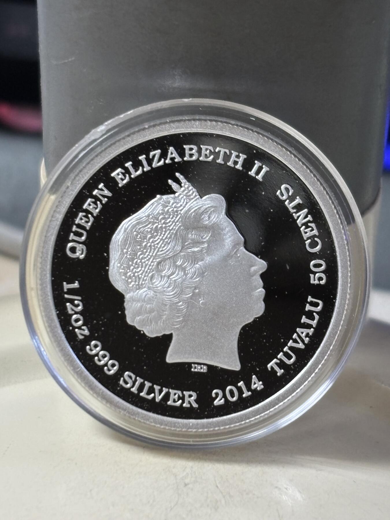 第188期拍卖 卡册图瓦卢2014年1/2盎司初生宝宝彩色纪念银币，999银，