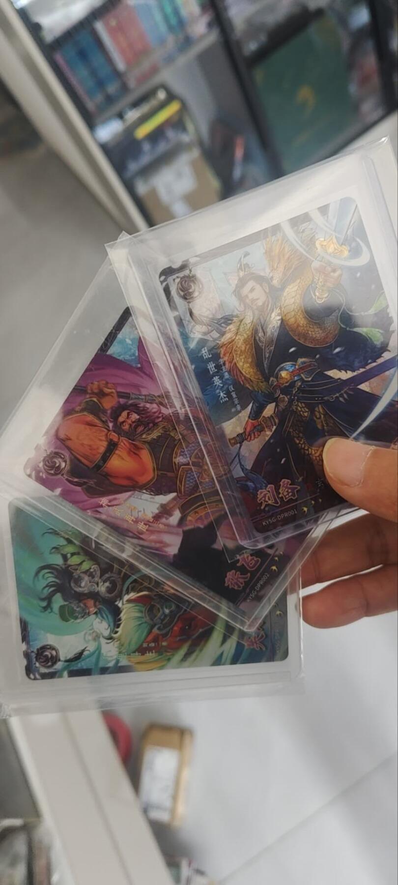 秋原瞳的小店第三十三期（持续跟新中，凑套，入册千万别错过） 卡游三国紫玉刘备关羽张飞050/199.057/199.054/199兄弟三人一套齐，非常难得！！