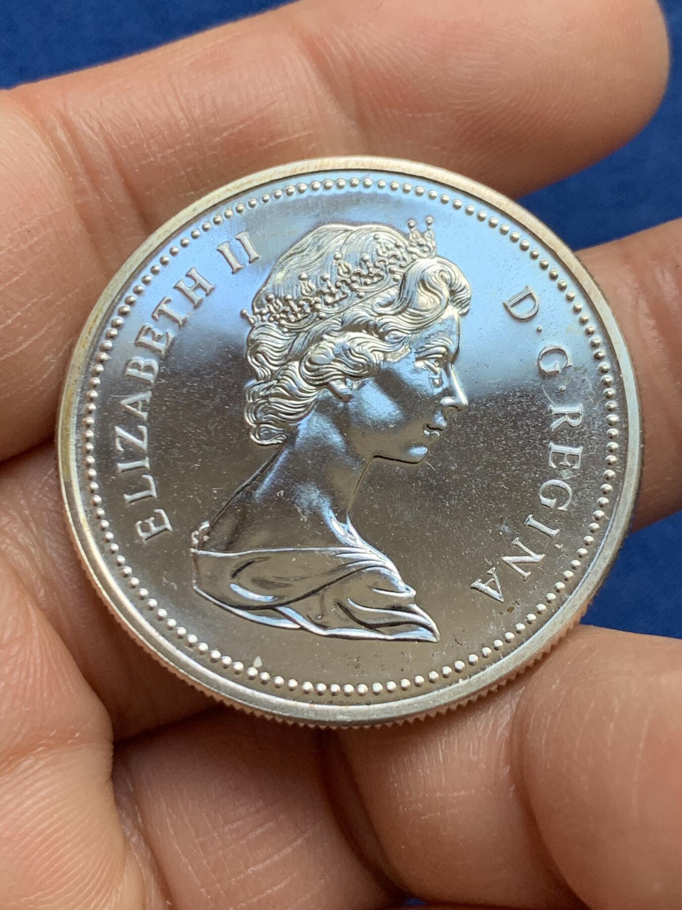 《竞宝斋》第459场 周日，周一，2场连拍 （全场包邮）欢迎送拍 加拿大1975年卡尔加里骑警队成立100周年1元银币，23.5克，500银