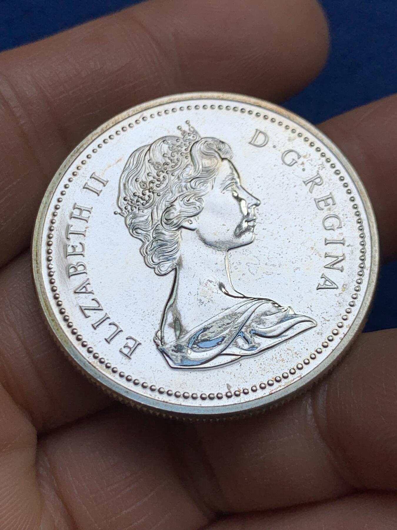 《竞宝斋》第459场 周日，周一，2场连拍 （全场包邮）欢迎送拍 加拿大1975年卡尔加里骑警队成立100周年1元银币，23.5克，500银