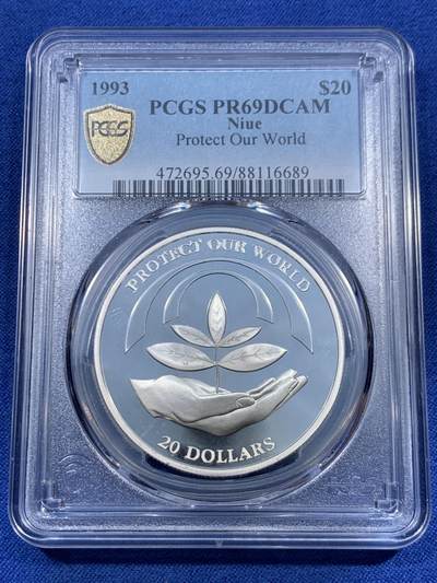 《竞宝斋》第459场 周日，周一，2场连拍 （全场包邮）欢迎送拍 - PCGS PR69DC 纽埃1993年保护地球20元精制大银币，捧着树苗的手寓意着生命和希望，31.47g，925银