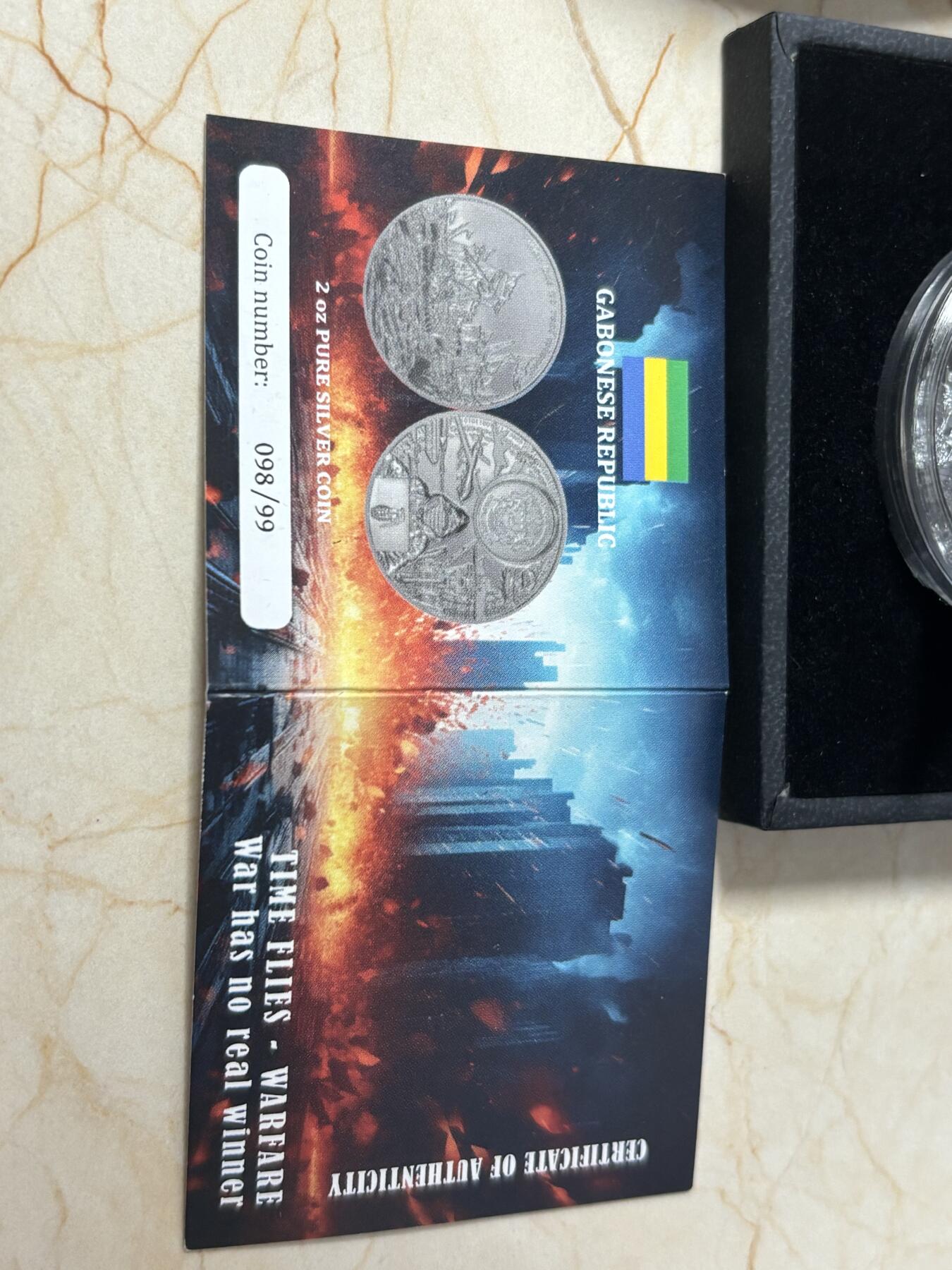 第189期拍卖 加蓬2023年过去与未来战争没有赢家钌化2盎司银币，999银，发行99枚