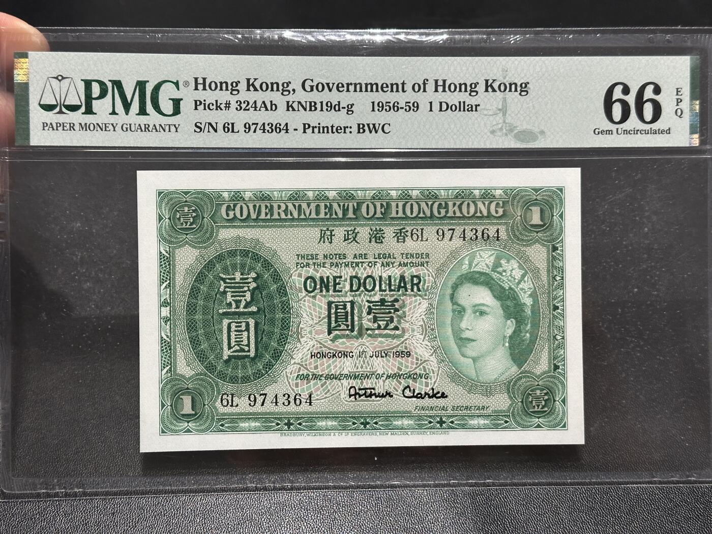 《外钞收藏家》第六百零三期（精选场）（本平台长期征集拍品、欢迎藏友们联系合作） 1959年香港政府1元 PMG66 BWC版