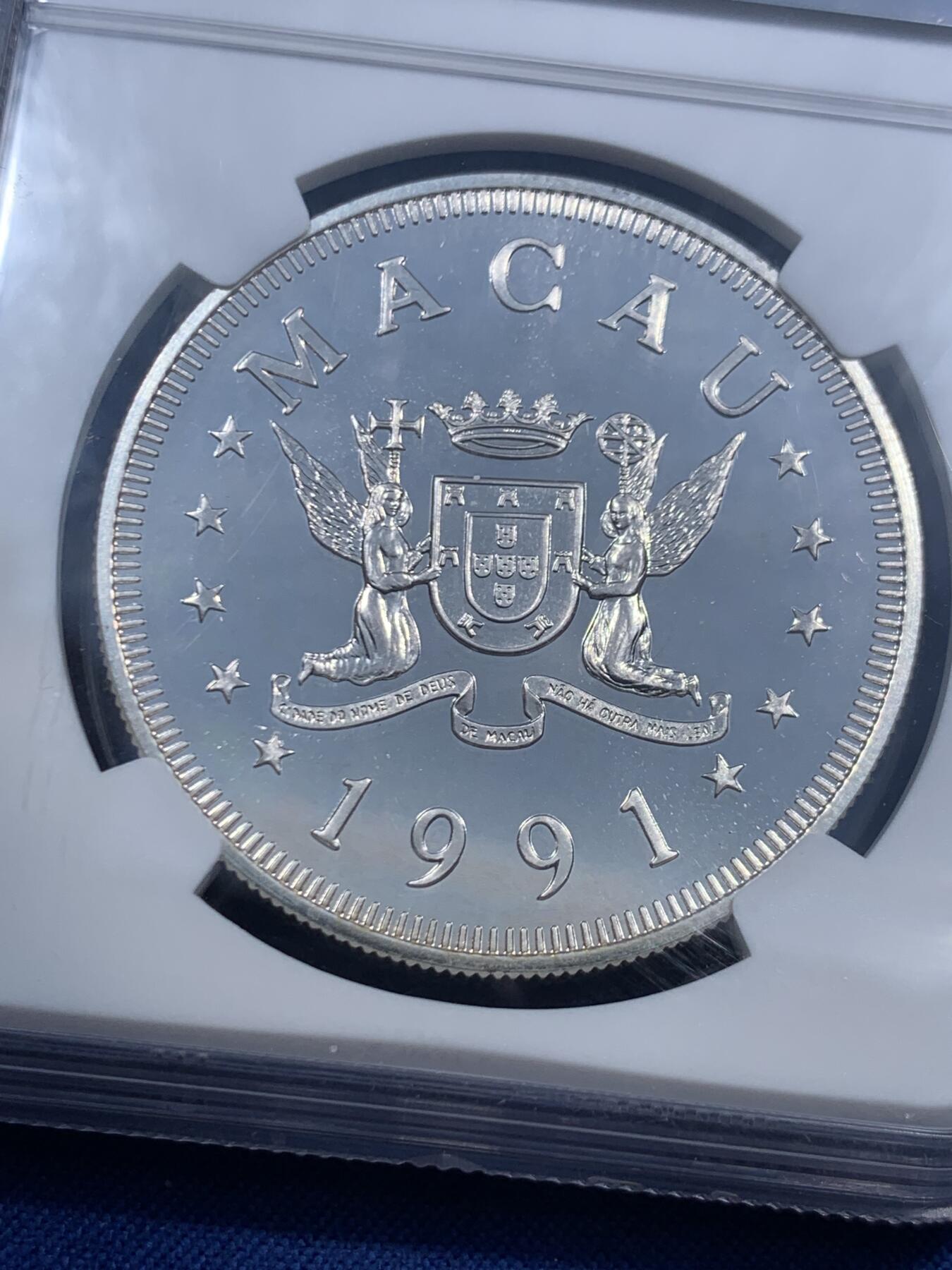 《竞宝斋》第459场 周日，周一，2场连拍 （全场包邮）欢迎送拍 NGC MS69 中国澳门1991年生肖羊100元银币，普制发行比精制少许多。类PL镜面底板，状态一流，亚军分，获得更高评分数目3枚。