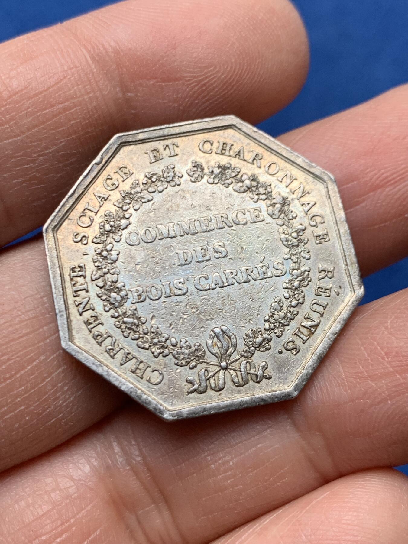 《竞宝斋》第460场 周日，周一，2场连拍 （全场包邮）欢迎送拍 法国巴黎木材贸易供给八角银代币 早期无边铭 10.75克 29.4mm