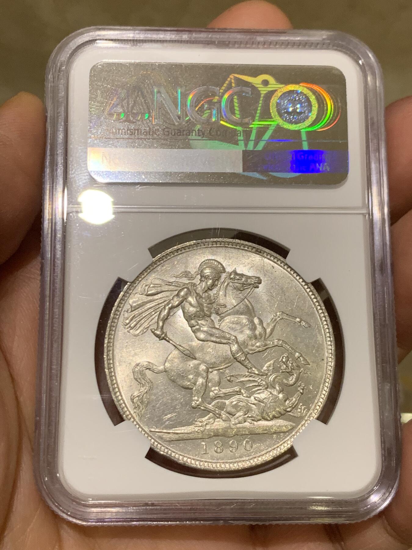 《竞宝斋》第460场 周日，周一，2场连拍 （全场包邮）欢迎送拍 NGC MS62 英国1890年高冠维多利亚马剑1克朗银币