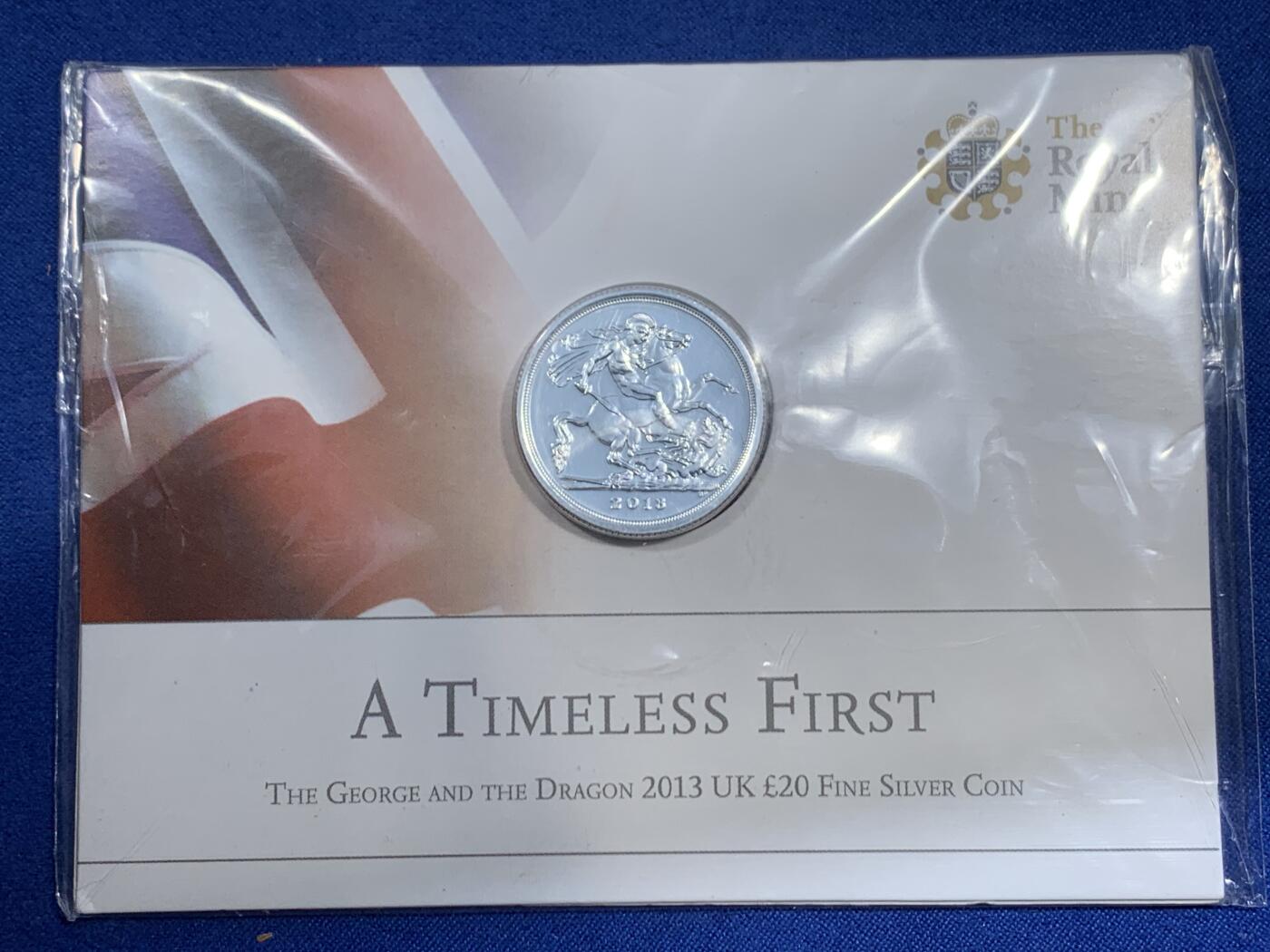 《竞宝斋》第460场 周日，周一，2场连拍 （全场包邮）欢迎送拍 2013年英国20英镑屠龙银马剑 999银材质 15.71克 未拆封品相